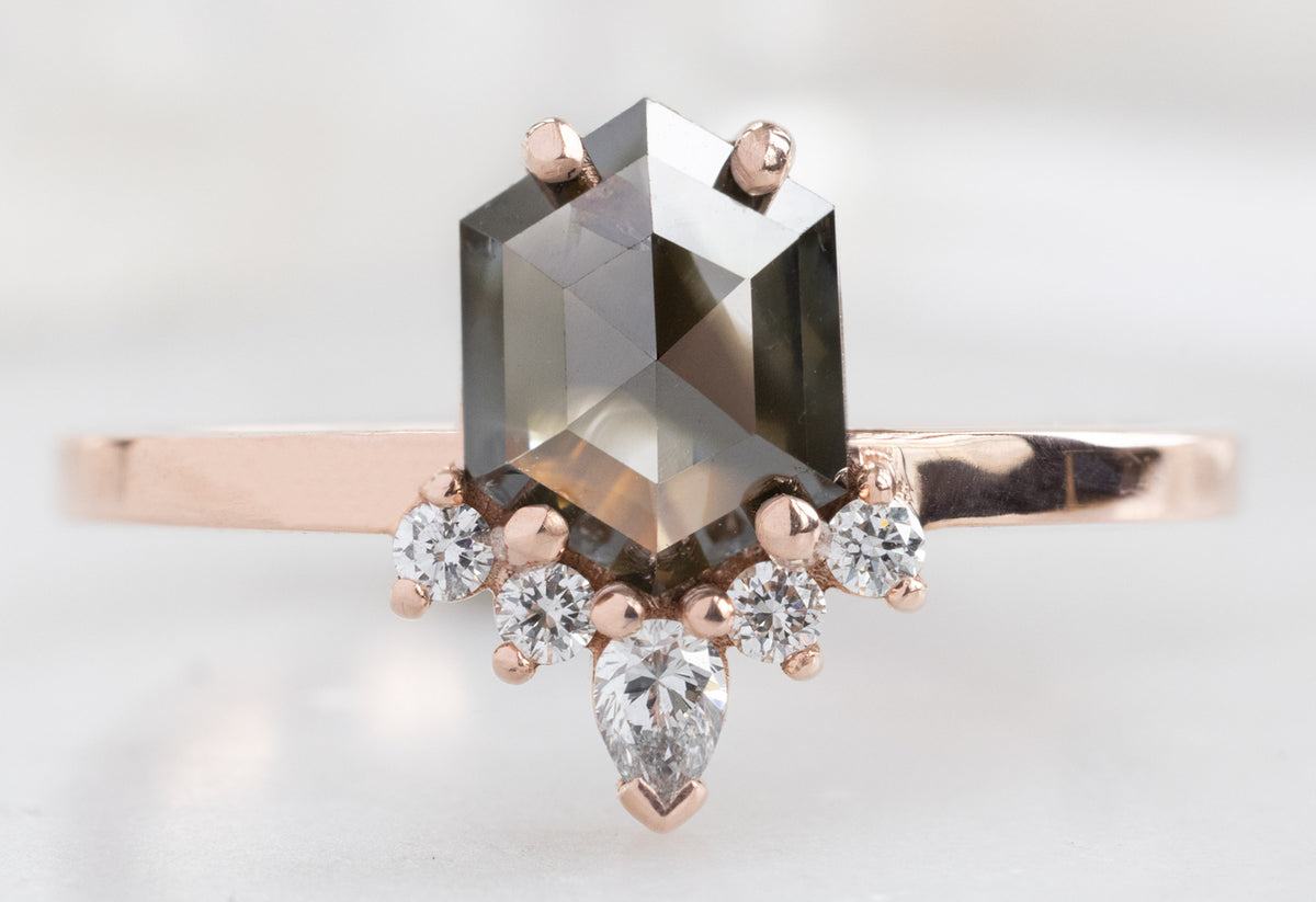 The Aster Ring with a Pear-Cut White Diamond