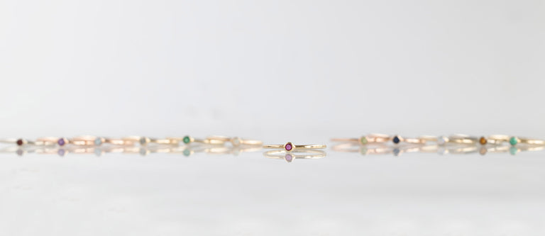 Alexis Russell Birthstone Stackers in a line