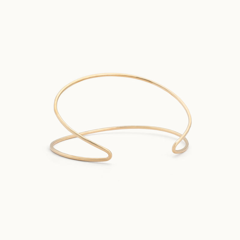 The Arrow Cuff Bracelet in Yellow Gold Filled on White Background