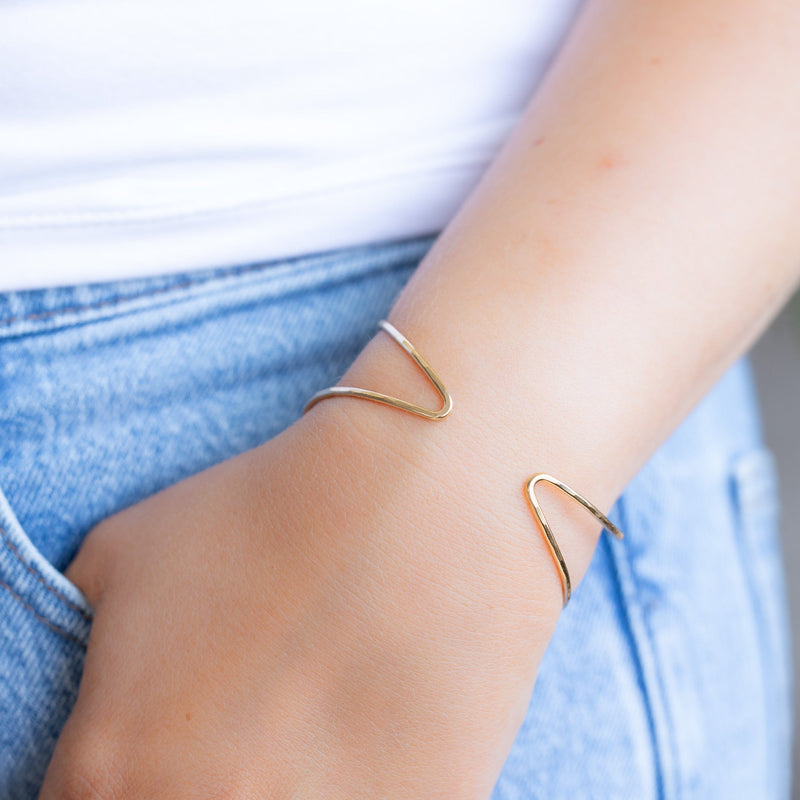 The Arrow Cuff Bracelet in Yellow Gold Filled on Model