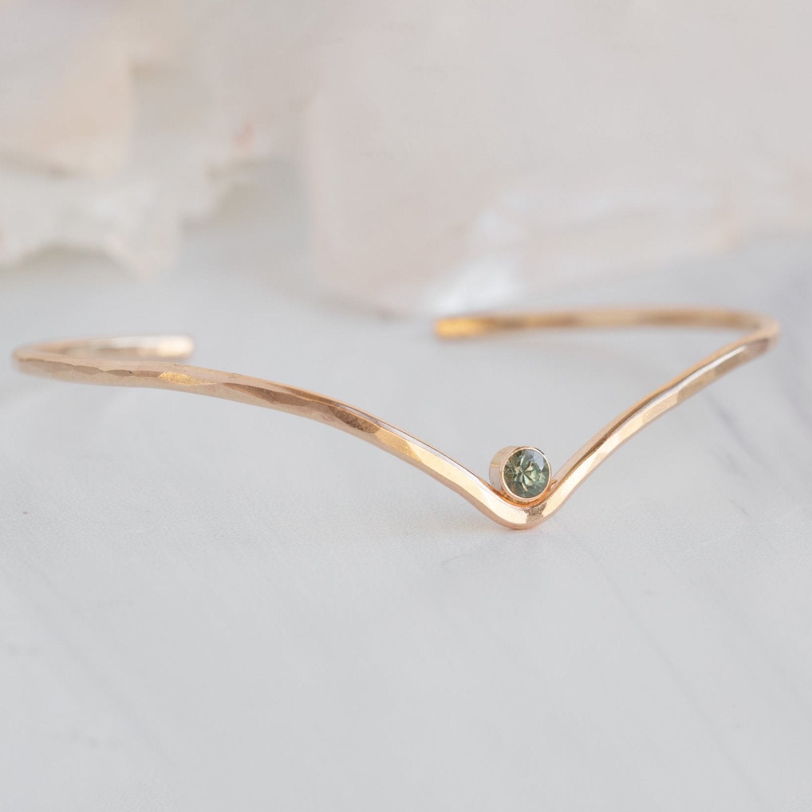 The Montana Sapphire Peak Cuff Bracelet in Yellow Gold Filled on White Marble