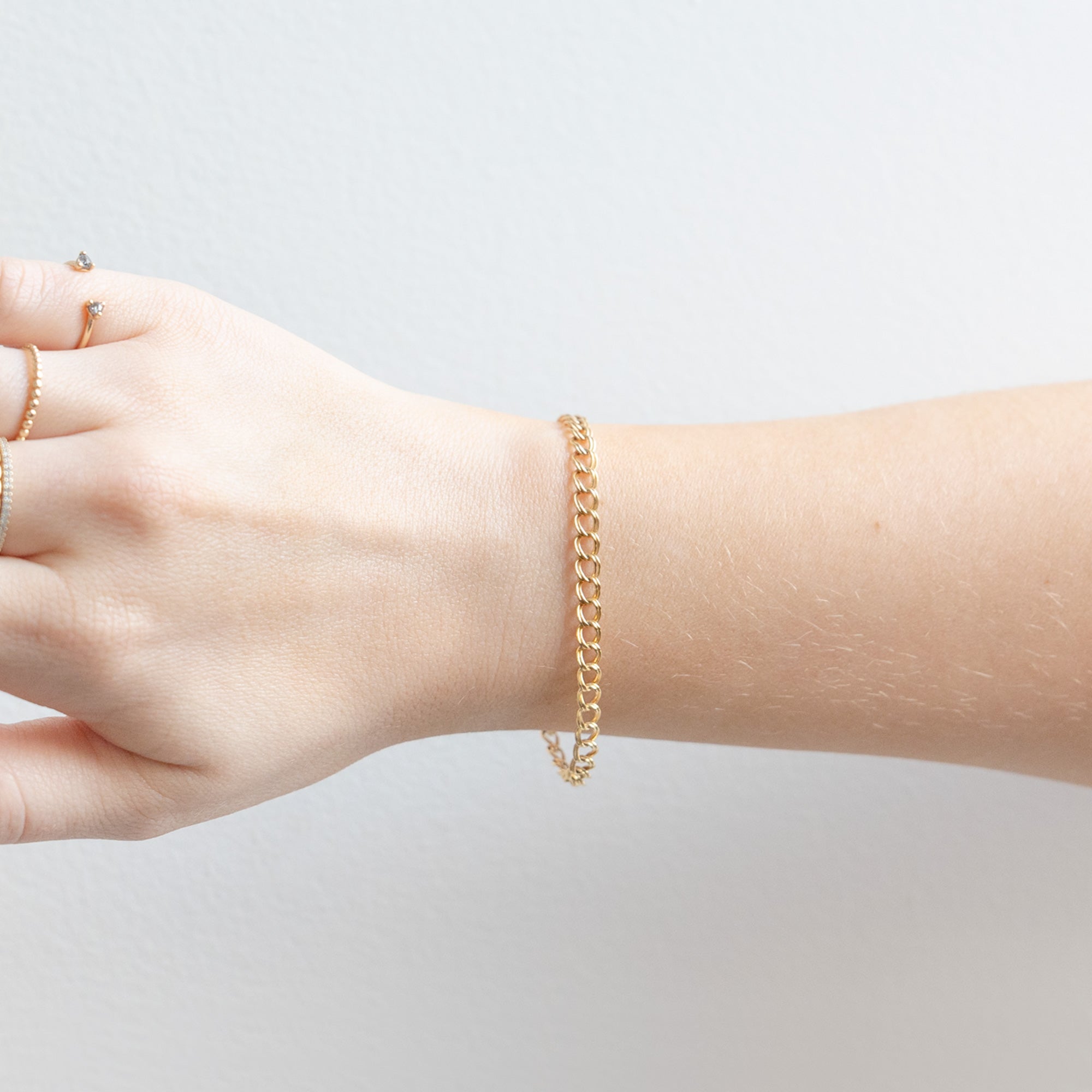 The Bold Curb Chain Bracelet in Yellow Gold Filled on Model