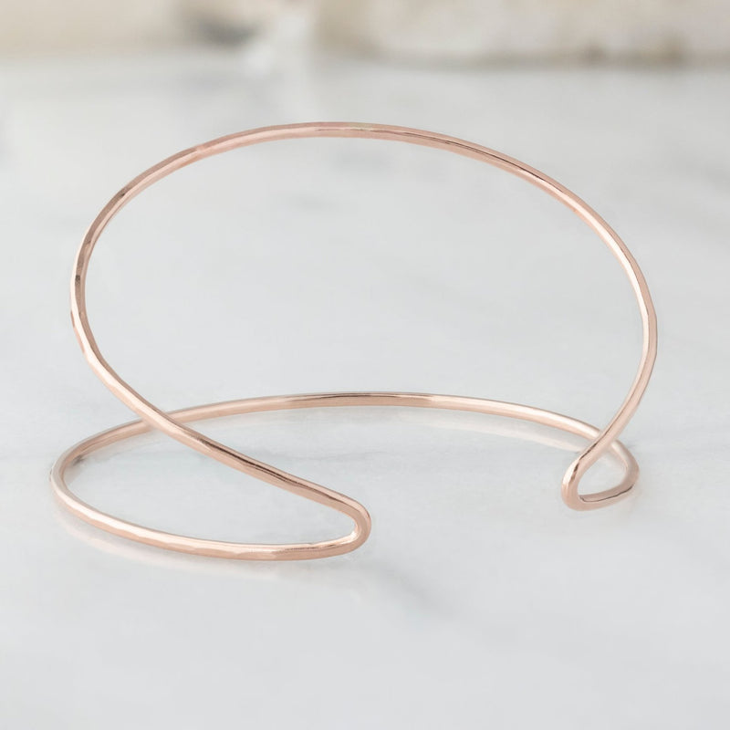 The Arrow Cuff Bracelet in Rose Gold Filled on White Marble