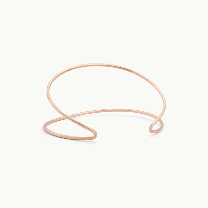 The Arrow Cuff Bracelet in Rose Gold Filled on White Background