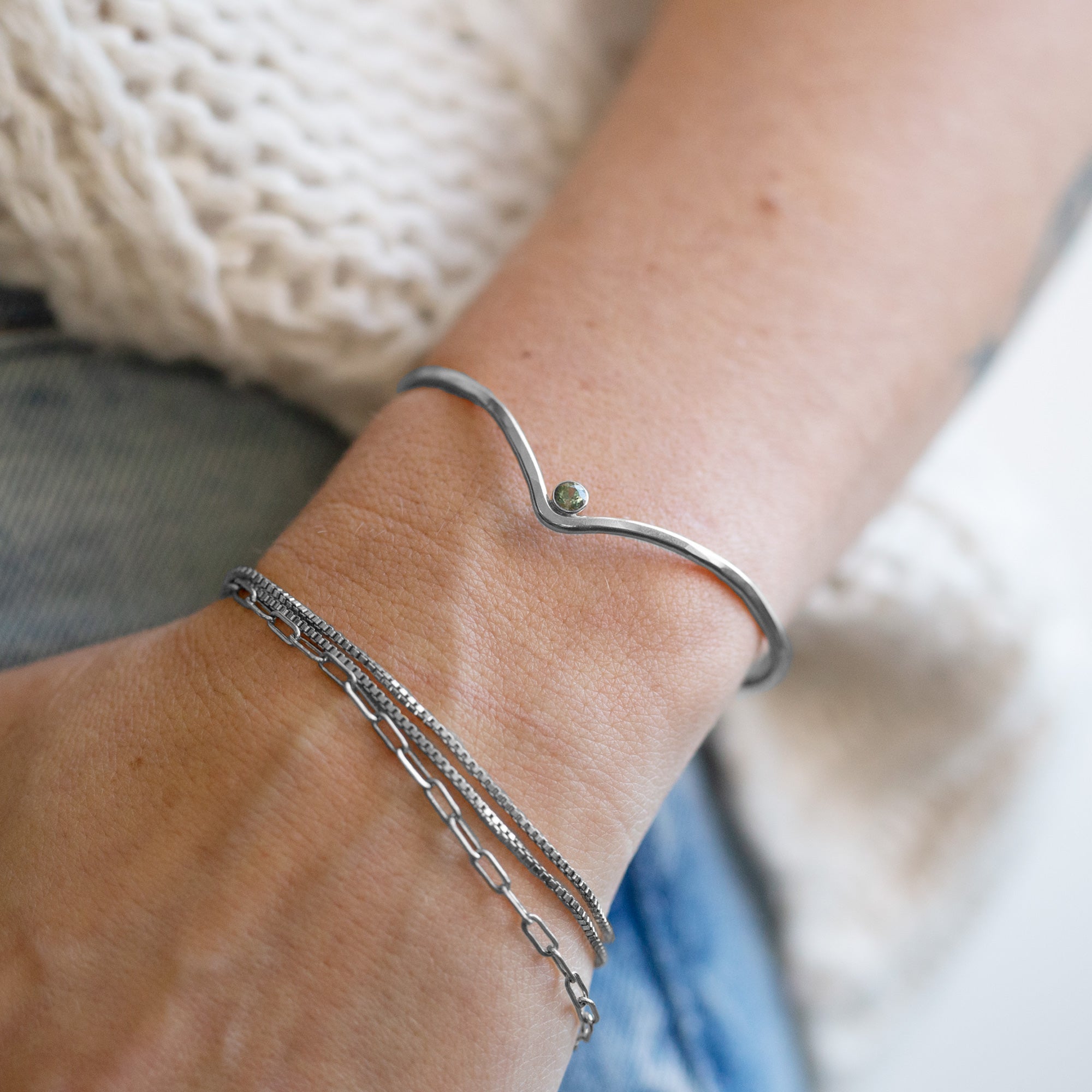 The Montana Sapphire Peak Cuff Bracelet in Sterling Silver Stacked on Model