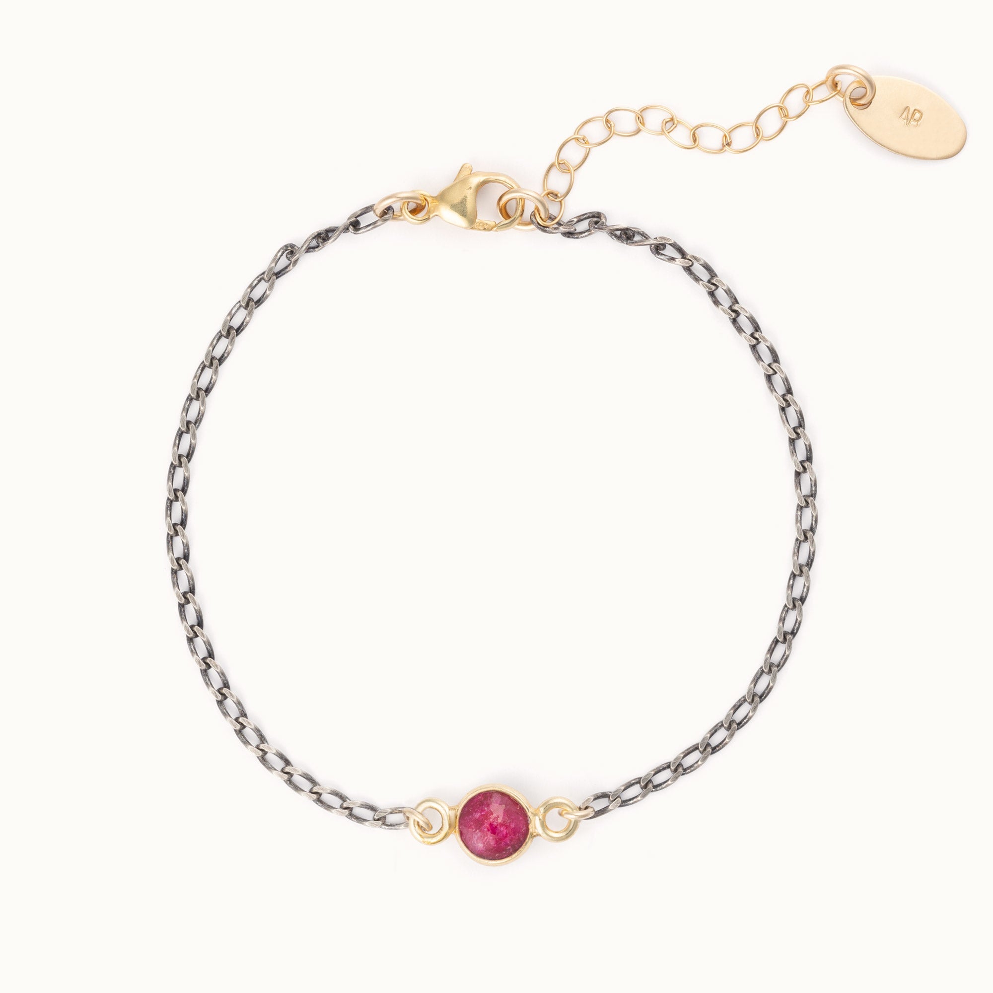 The Simple Ruby Gemstone Bracelet in Sterling Silver on White Background