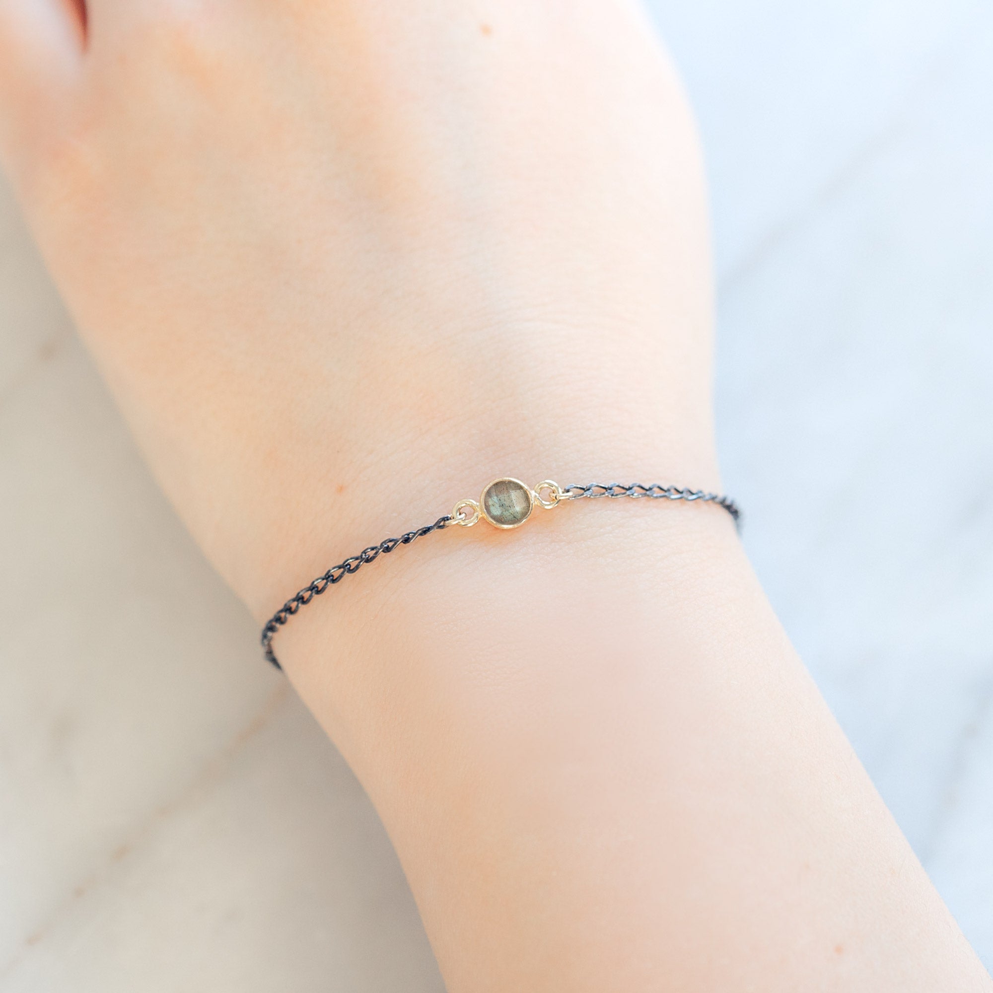 The Simple Labradorite Gemstone Bracelet in Sterling Silver on White Marble