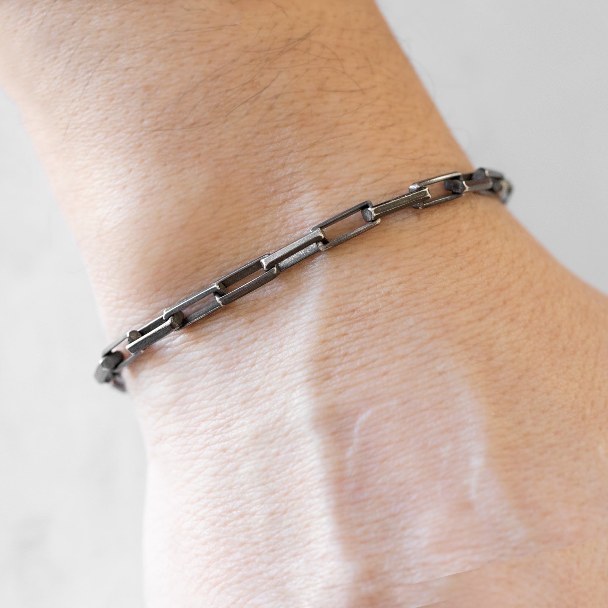 The Men's Drawn Cable Chain Bracelet in Oxidized Sterling Silver on Model