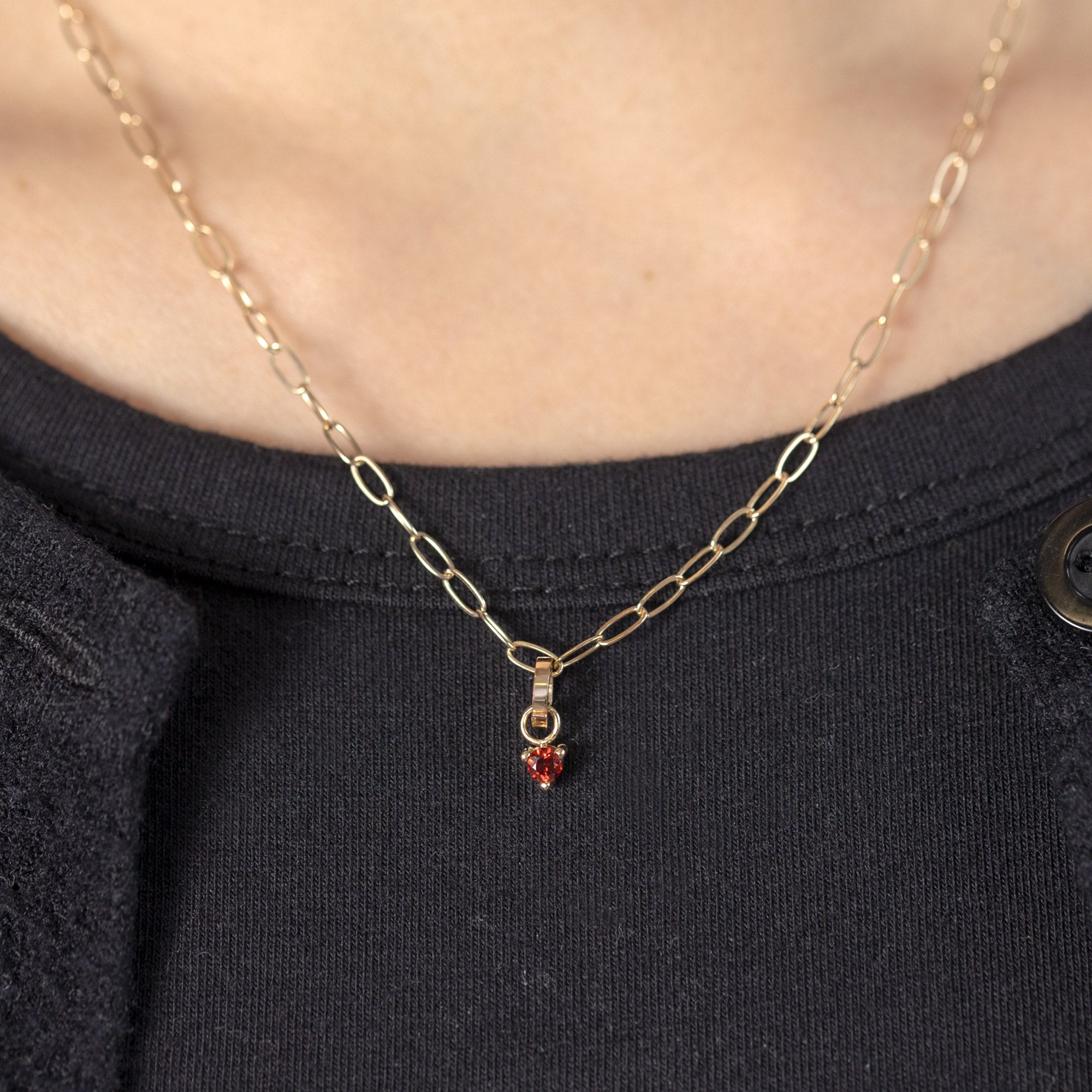 The Garnet Birthstone Charm in 10K Yellow Gold on Drawn Cable Chain Necklace on Model