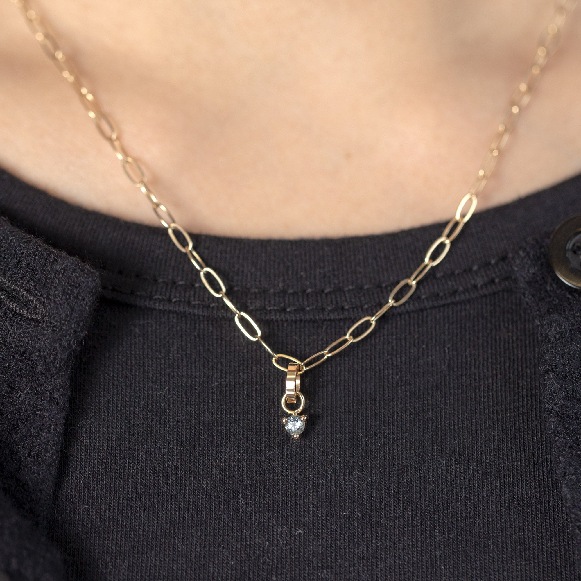 The Aquamarine Birthstone Charm in 10K Yellow Gold on Drawn Cable Chain Necklace on Model