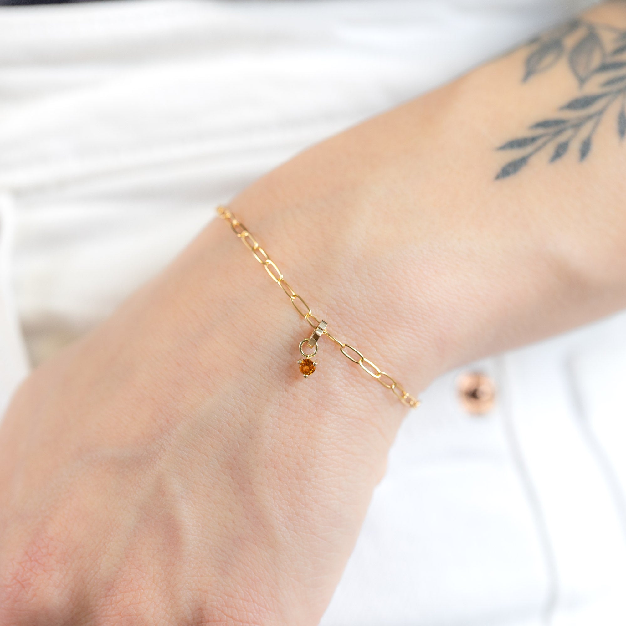 The Citrine Birthstone Charm in 10K Yellow Gold on Drawn Cable Chain Bracelet on Model