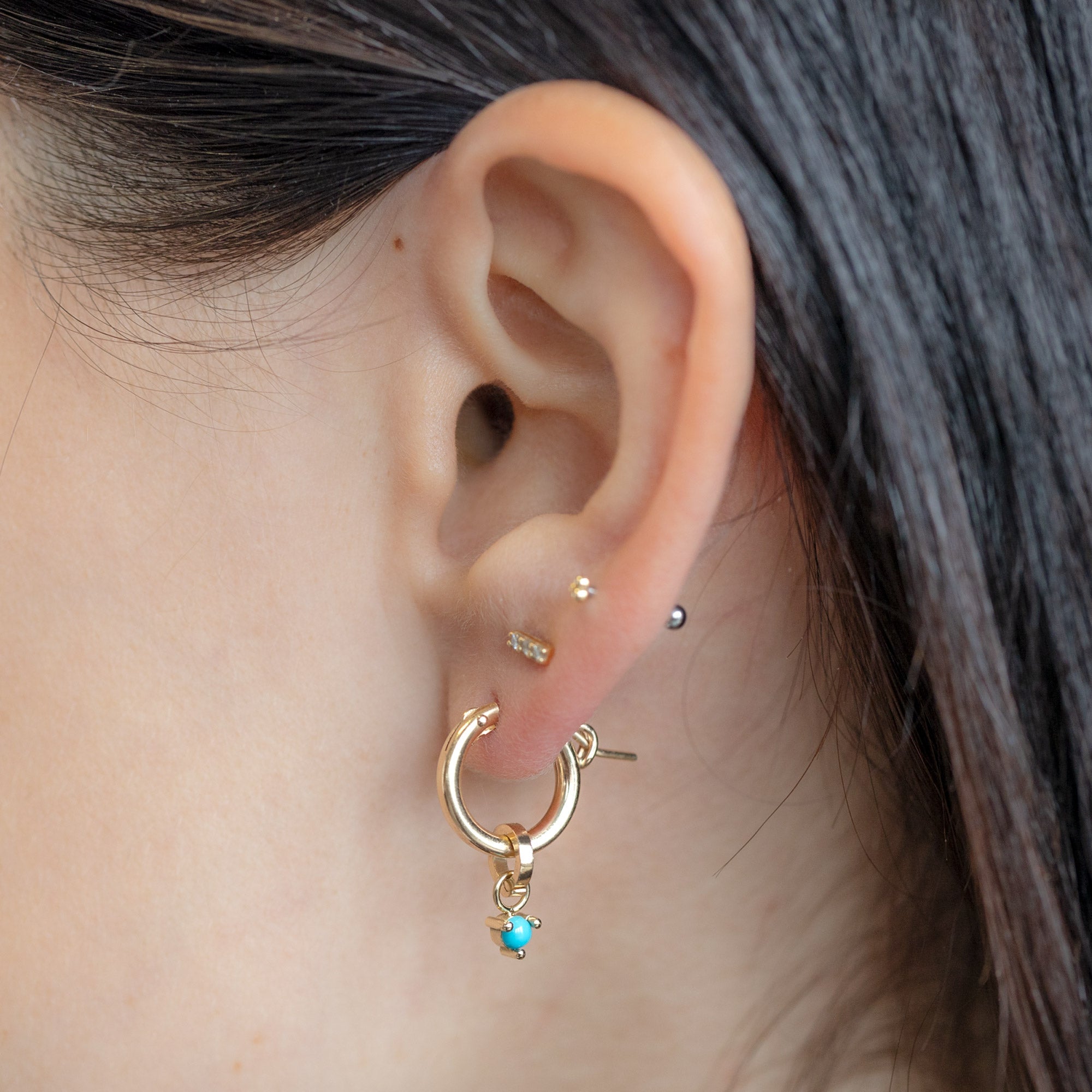 The Turquoise Birthstone Charm in 10K Yellow Gold on Charm Hoop on Model