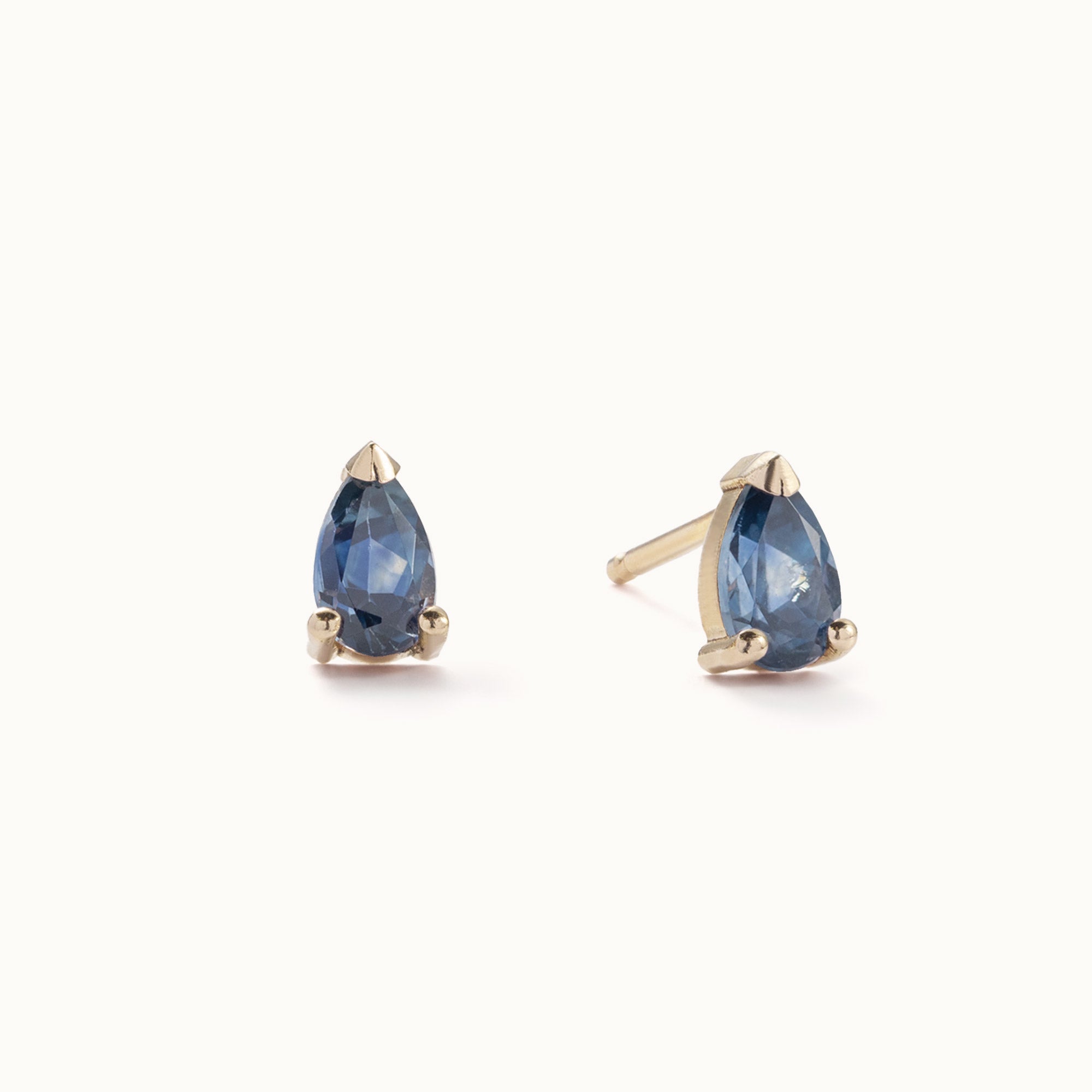 The Montana Sapphire Stud Earrings in 10K Yellow Gold on White Background