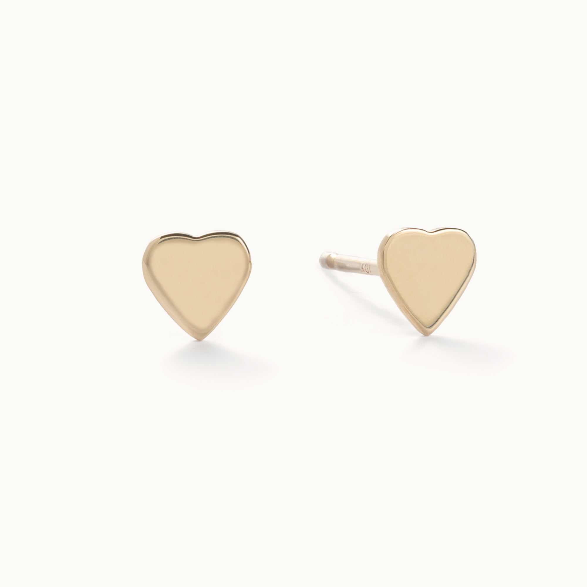 The Sweetheart Stud Earrings in 10K Yellow Gold on White Background