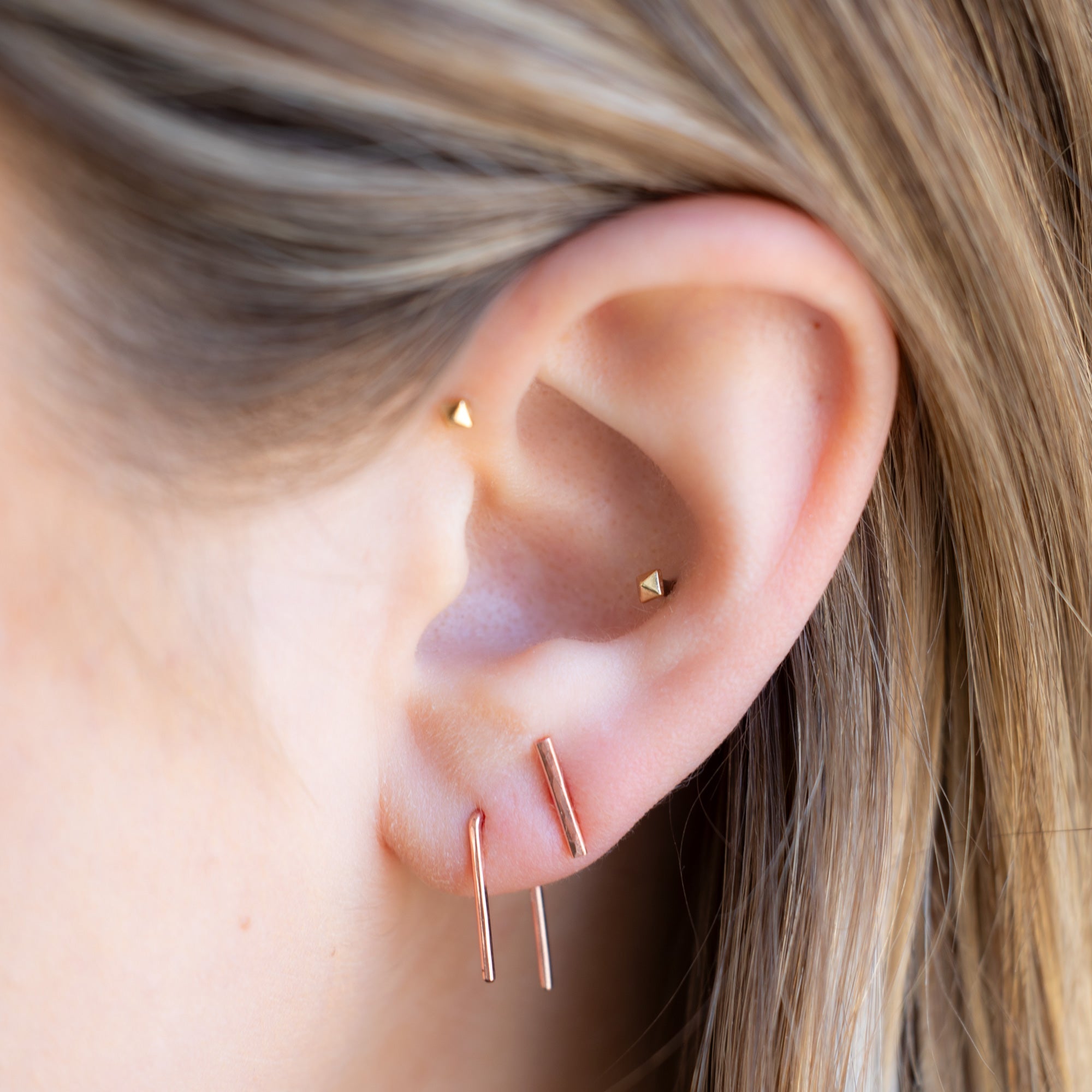 buy:the-staple-hoop-earrings-14k-rose-gold,the-linea-bar-stud-earrings-14k-rose-gold