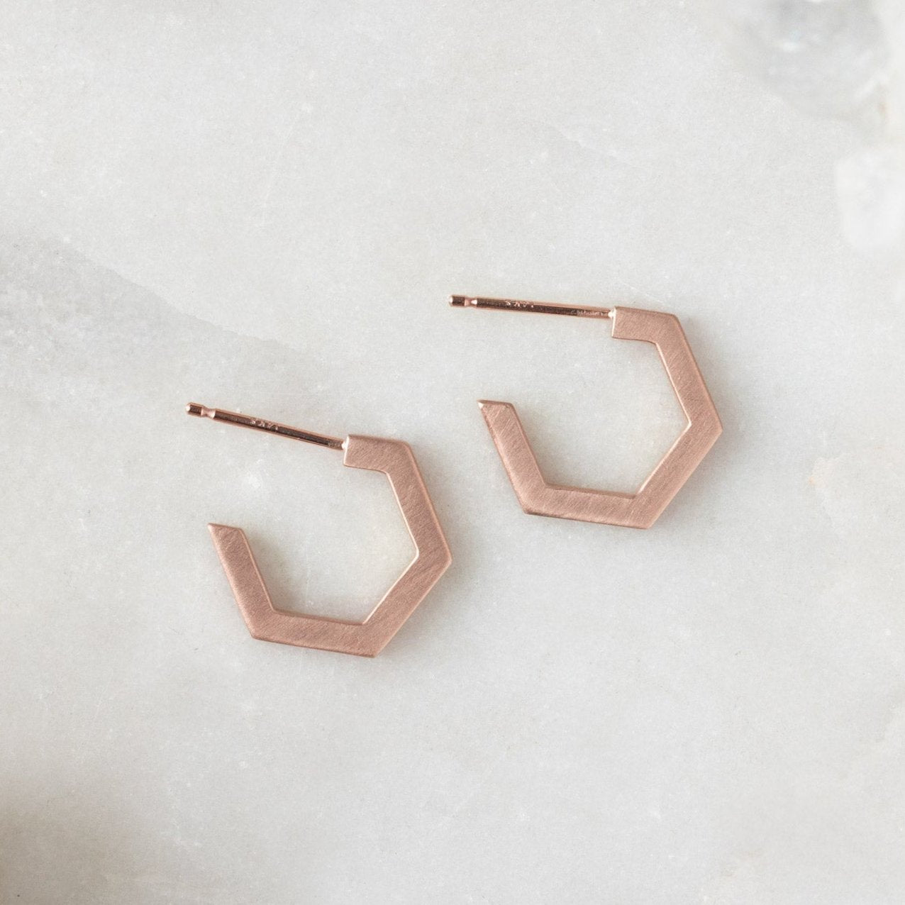 hexagon huggie hoops rose gold