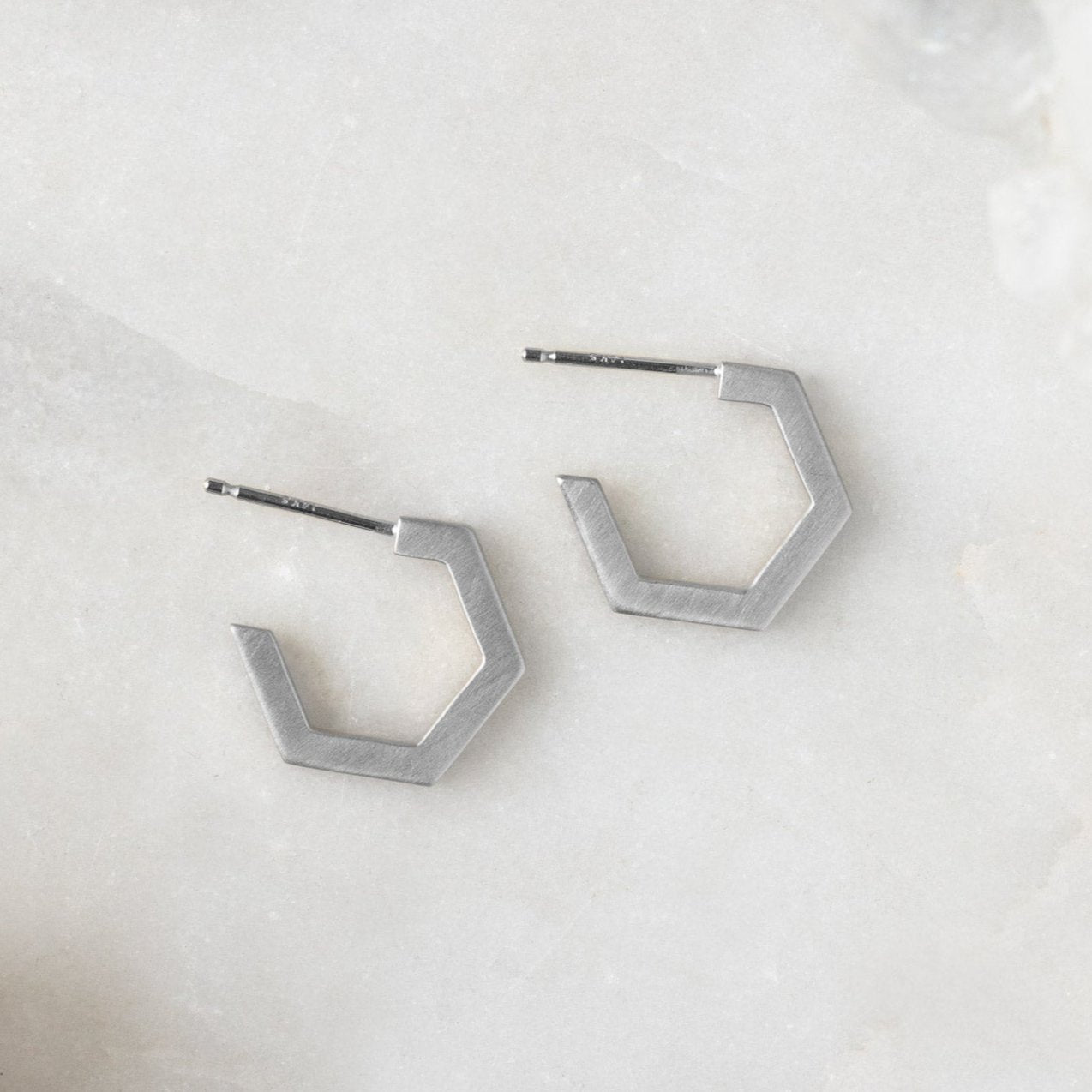 hexagon huggie hoops white gold