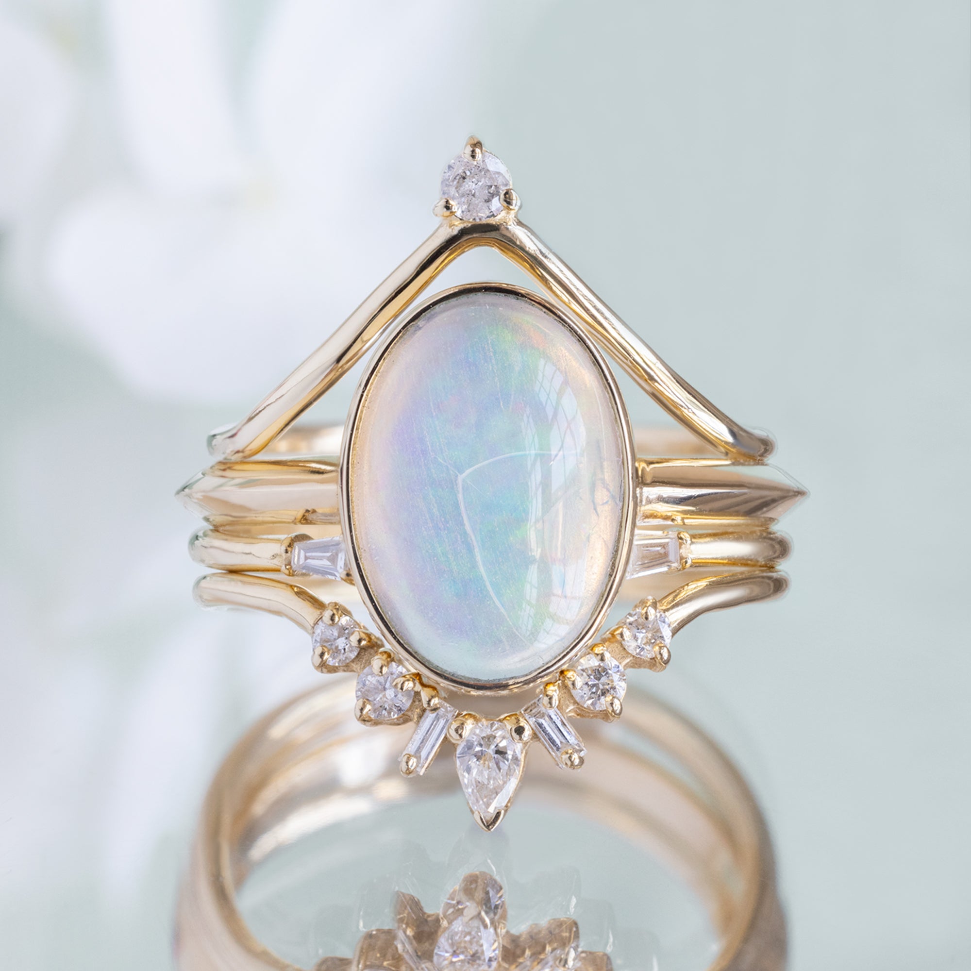 buy:one-of-a-kind-white-diamond-crown-stacking-band-14k-or-18k-yellow-gold,the-hazel-ring-1-97ct-oval-opal-in-14k-yellow-gold,one-of-a-kind-open-cuff-baguette-white-diamond-stacking-band-14k-or-18k-yellow-gold,one-of-a-kind-geometric-white-diamond-sunburst-stacking-band-14k-or-18k-yellow-gold