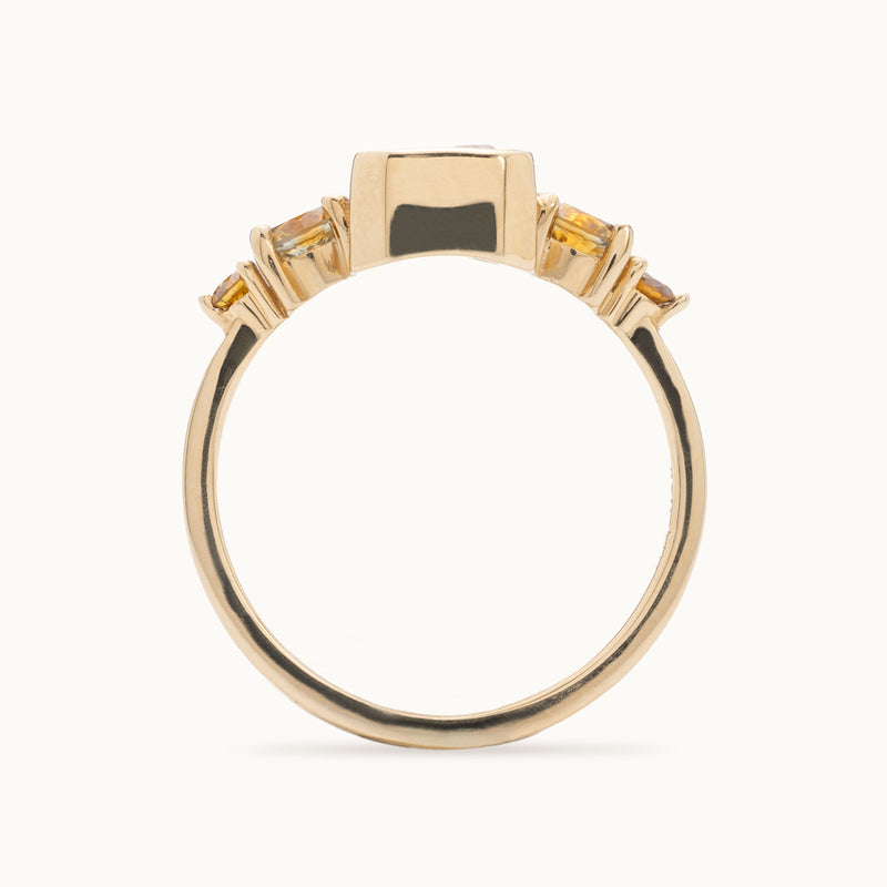 The Watercolor Ring | 2.04ct Emerald Cut Peach Sapphire in 14K Yellow Gold