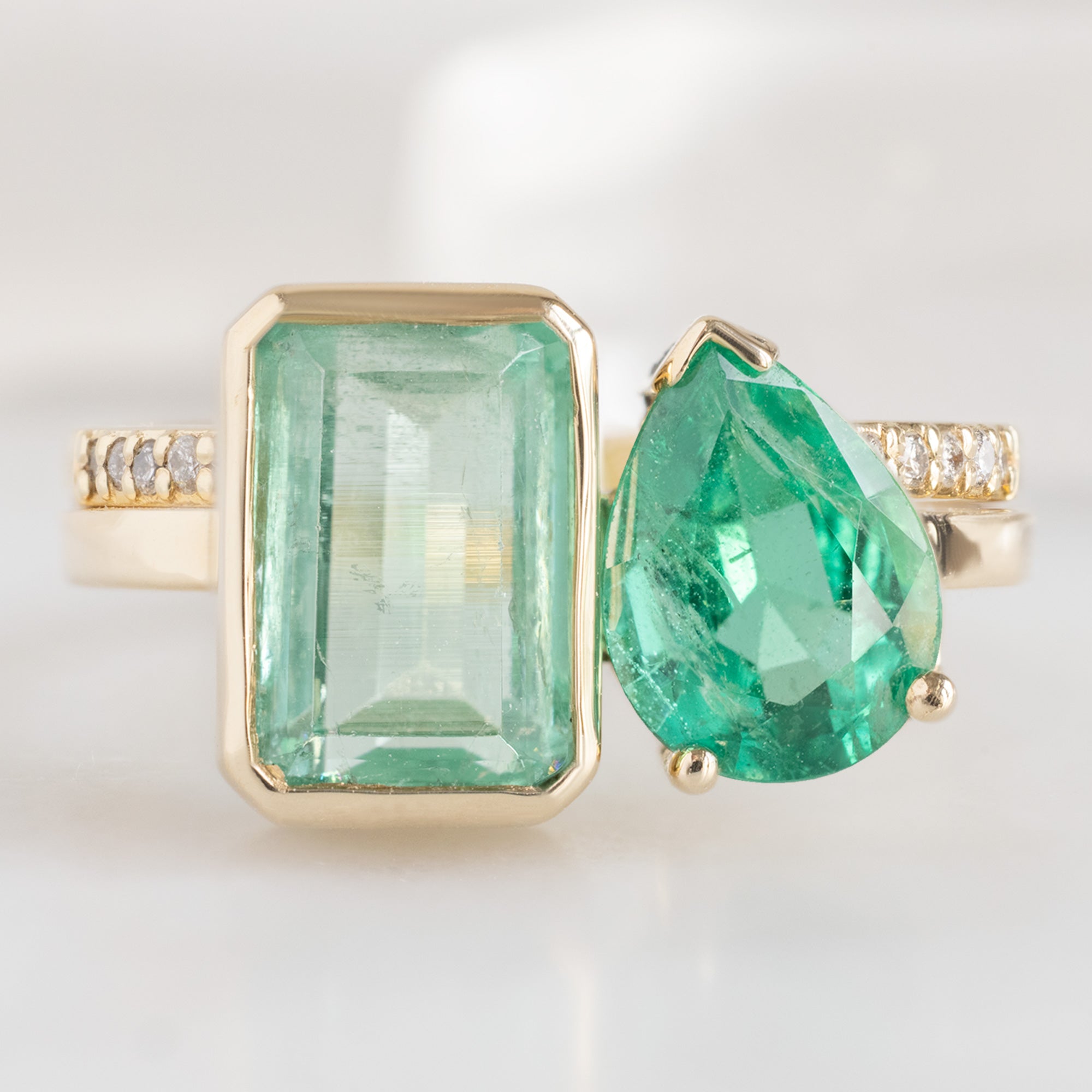 buy:one-of-a-kind-open-cuff-white-diamond-pave-stacking-band-14k-or-18k-yellow-gold,the-watercolor-you-and-me-ring-1-93ct-emerald-cut-and-pear-cut-emerald-in-14k-yellow-gold