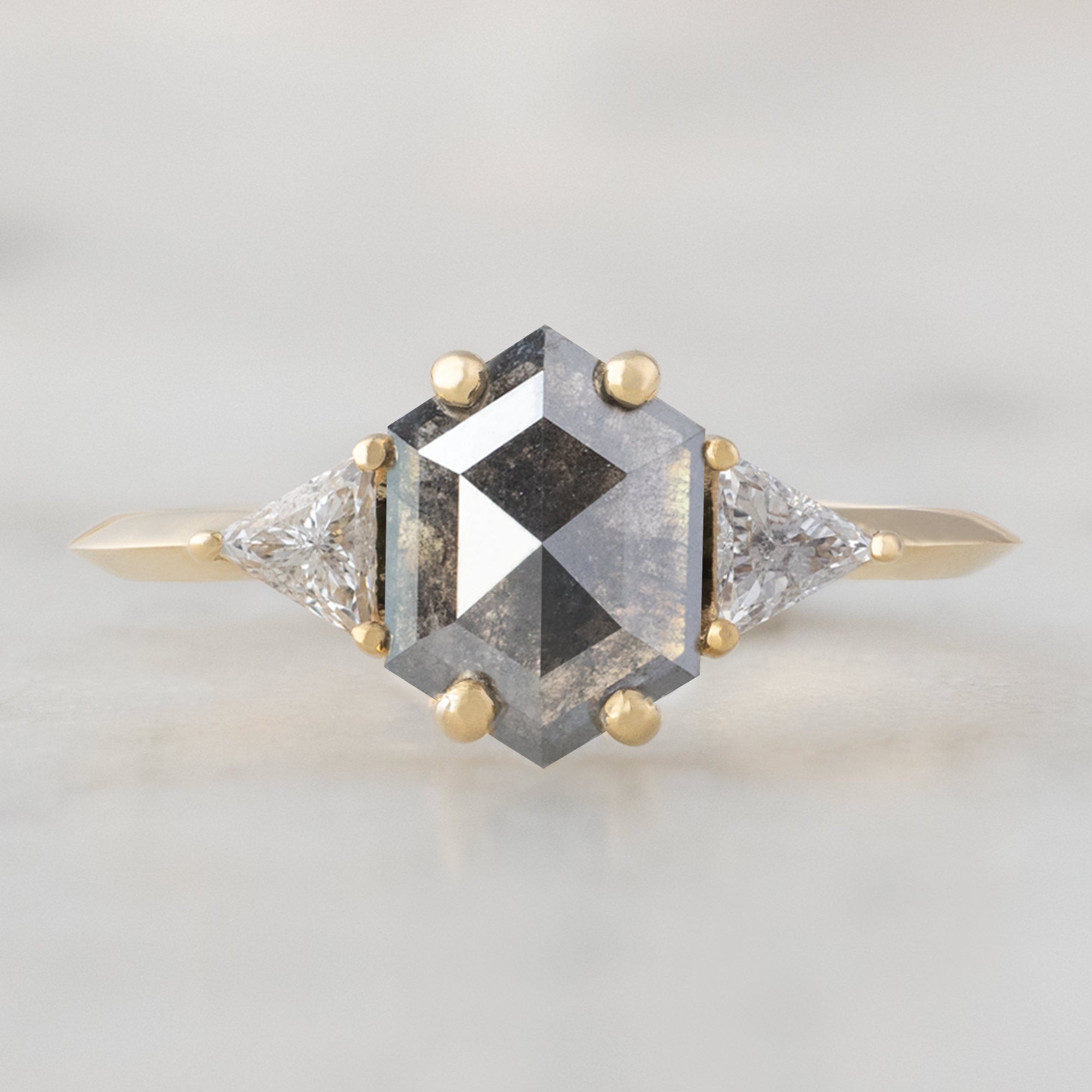 The Jade Ring with a 0.91ct Hexagonal Grey Diamond in 14K Yellow Gold on white background