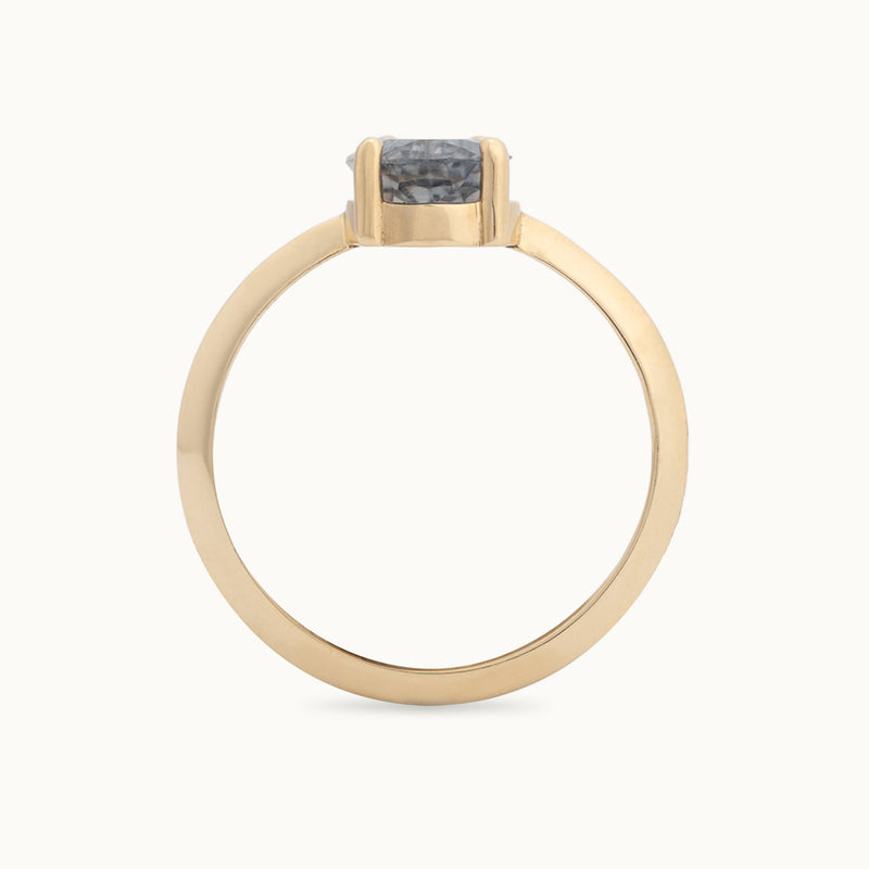 Profile View of The Bryn Ring with a 1.42ct Pear Cut Blue Sapphire in 14K Yellow Gold