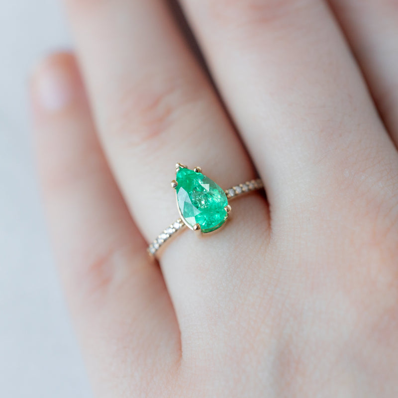 The Willow Ring with a 1.47ct Pear Emerald in 14K Yellow Gold on Model