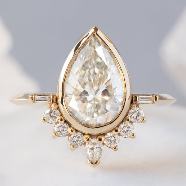 The Posy Ring with a 2.20ct Pear Lab Grown White Diamond in 14K Yellow Gold on White Crystal