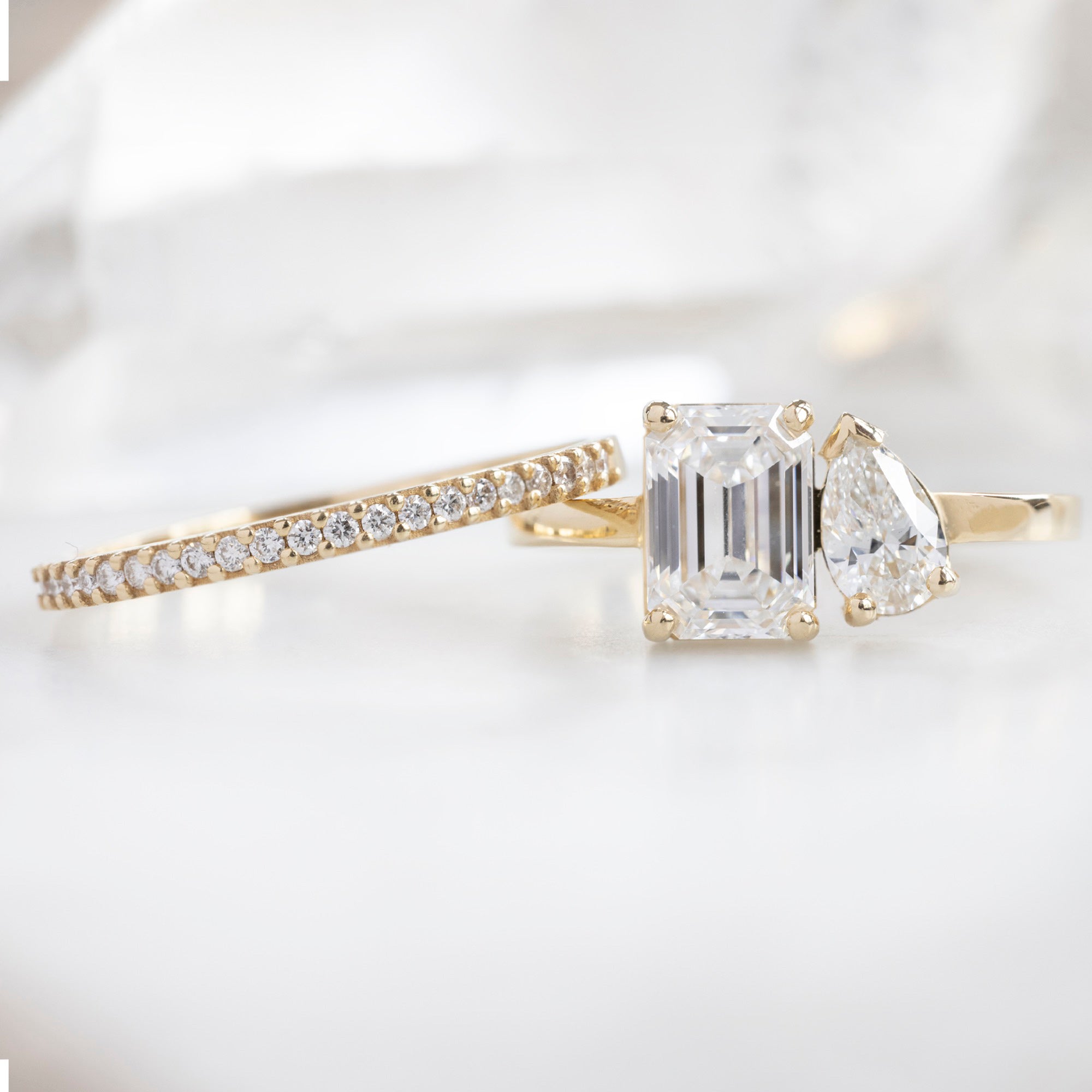 The You & Me Ring with a 1.50ct Emerald Cut Lab Grown White Diamond in 14K Yellow Gold with Pavé Diamond Stacking Band