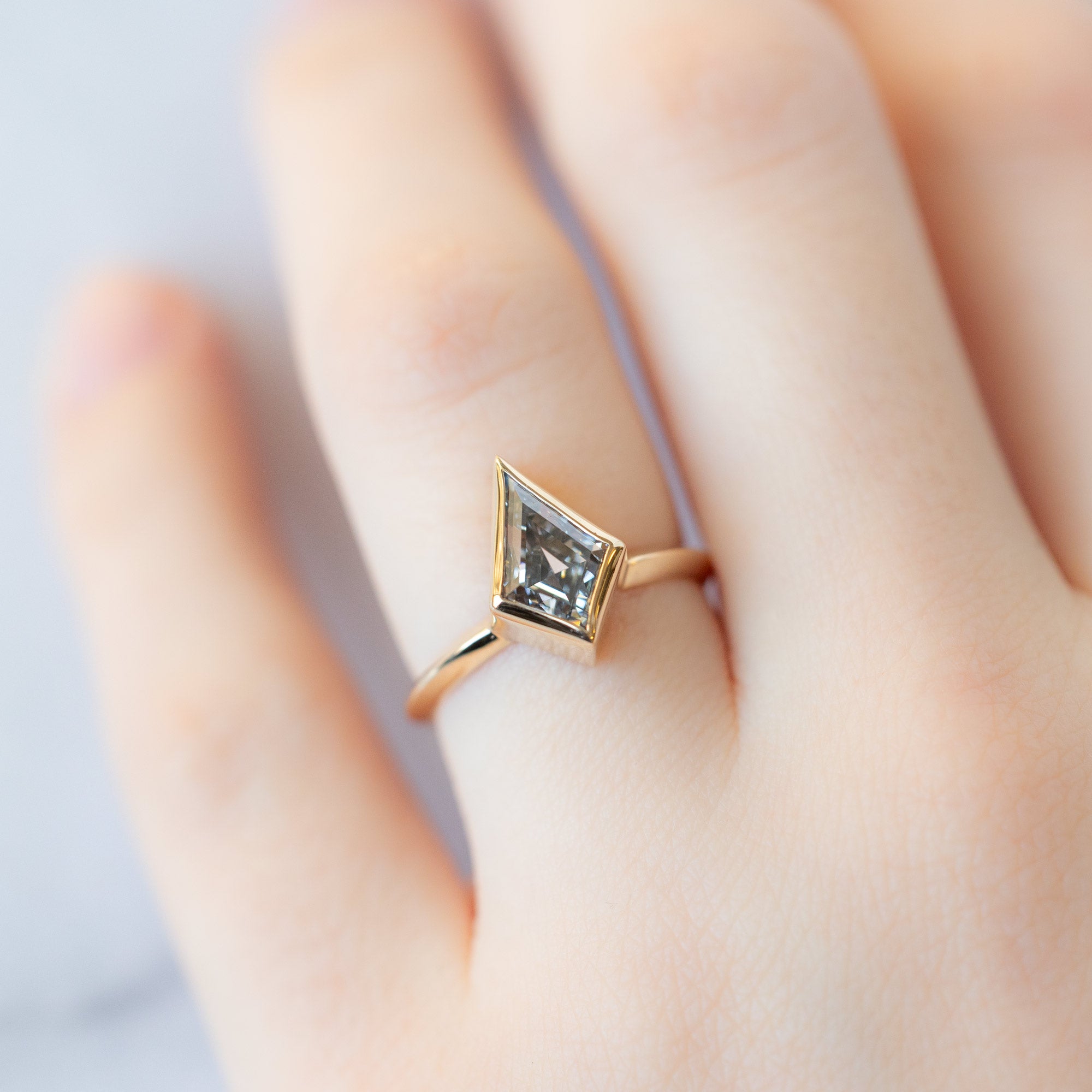 The Hazel Ring with a 2.00ct Lab Grown White Kite Diamond in 14K Yellow Gold on Model