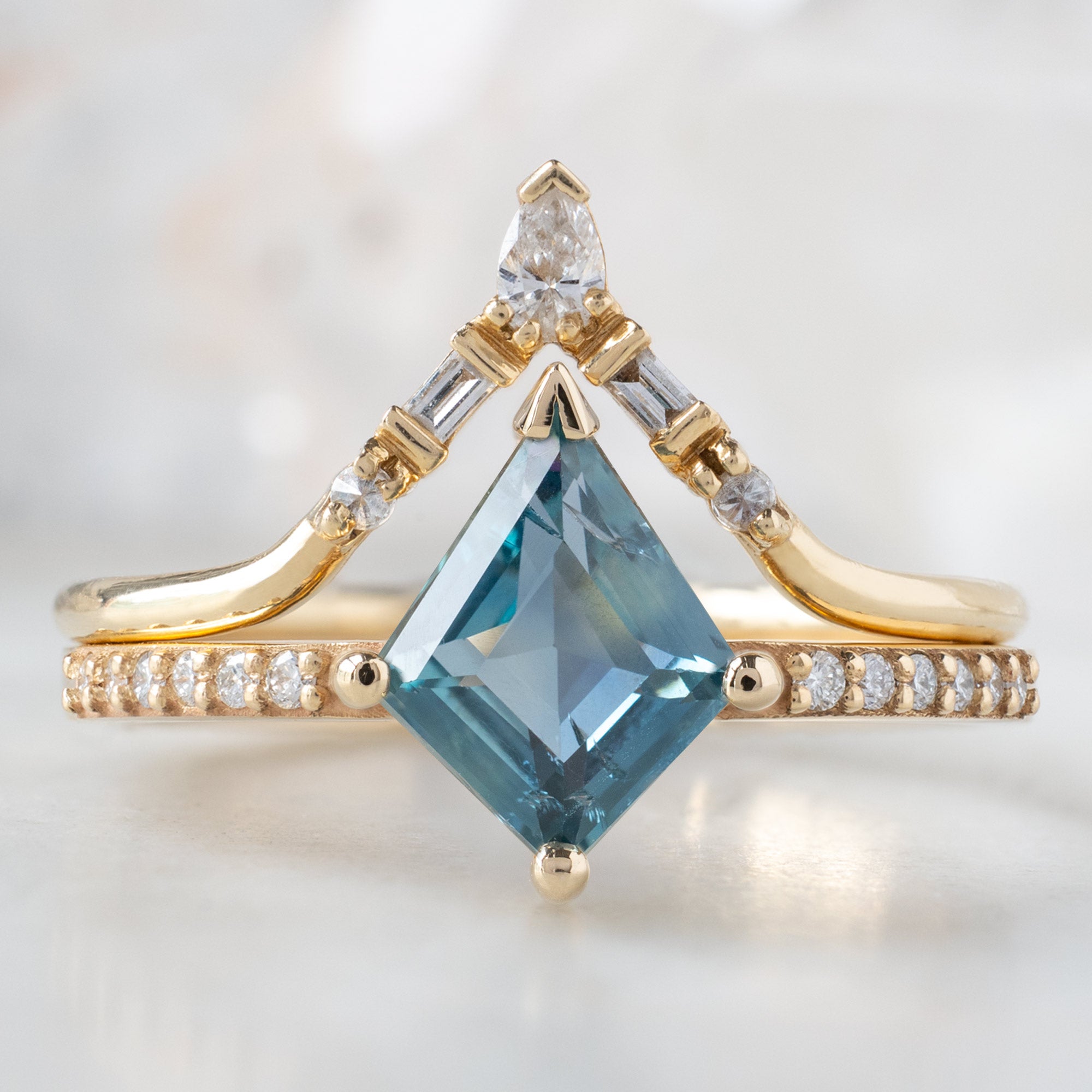 The Willow Ring with a 1.14ct Kite Blue Sapphire in 14K Yellow Gold  Stacked with White Diamond Tiara Stacking Band