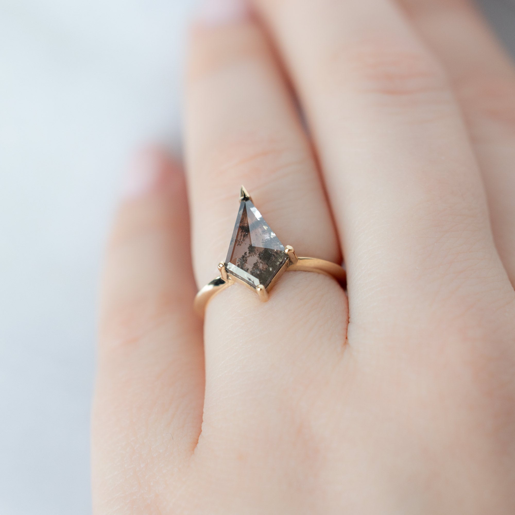 The Sage Ring with a 1.73ct Lab Grown Salt and Pepper Kite Diamond in 14K Yellow Gold on Model