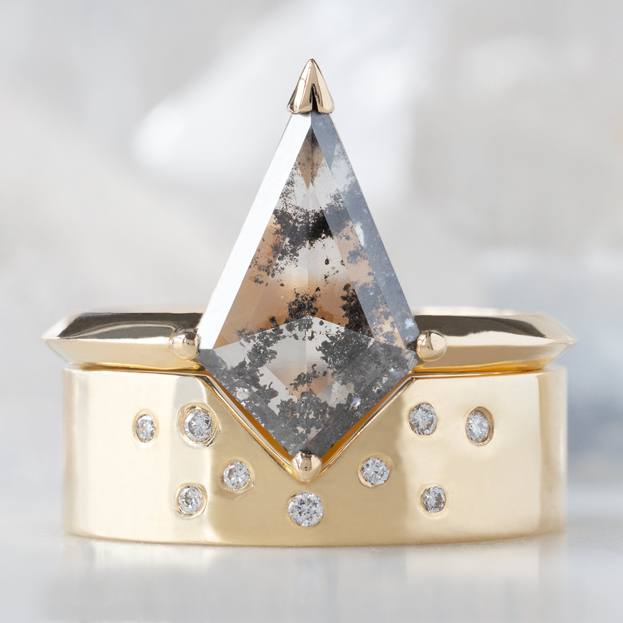 The Sage Ring with a 1.73ct Lab Grown Salt and Pepper Kite Diamond in 14K Yellow Gold Stacked with the Constellation Peak Cut-Out Stacking Band