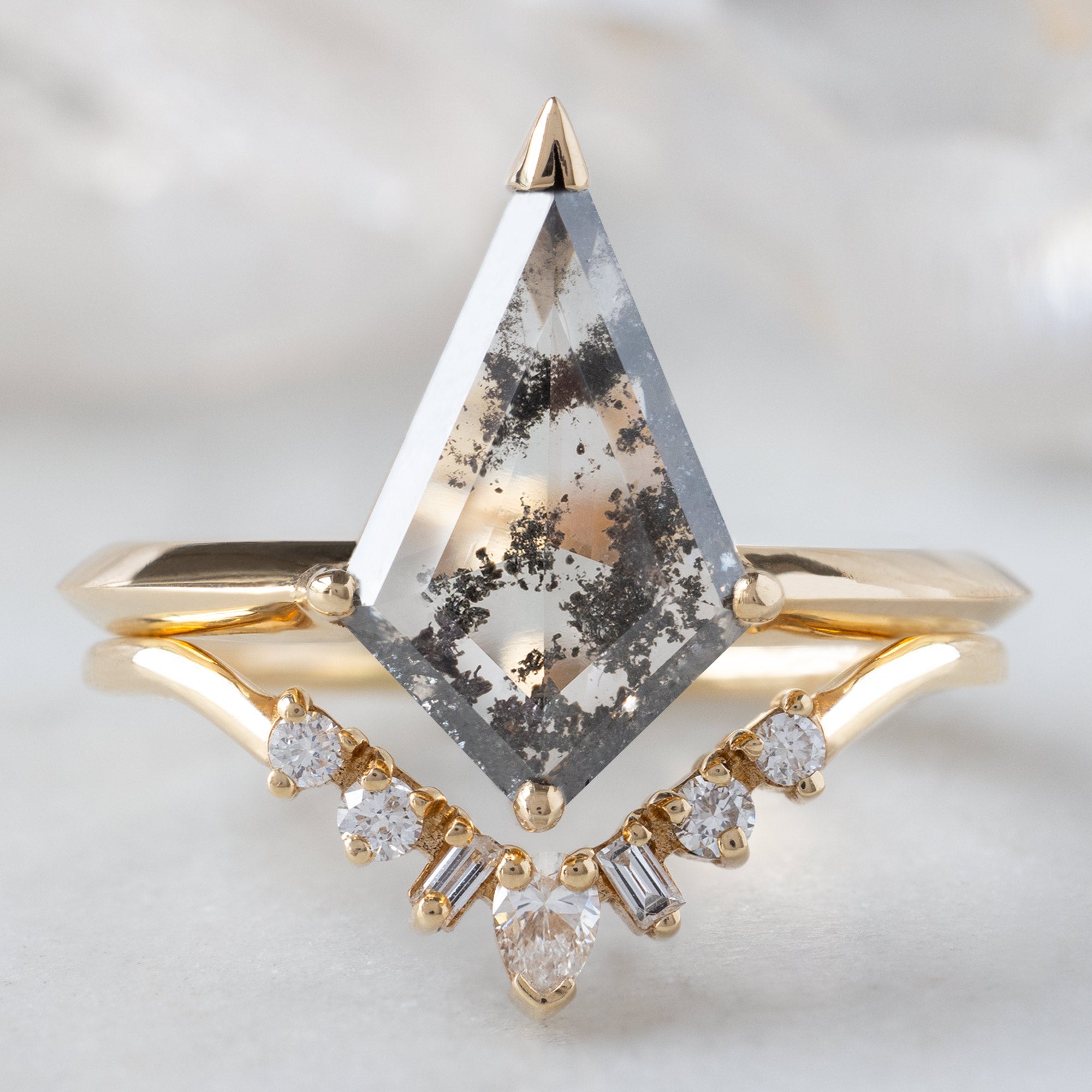 The Sage Ring with a 1.73ct Lab Grown Salt and Pepper Kite Diamond in 14K Yellow Gold Stacked with the Geometric White Diamond Sunburst Stacking Band