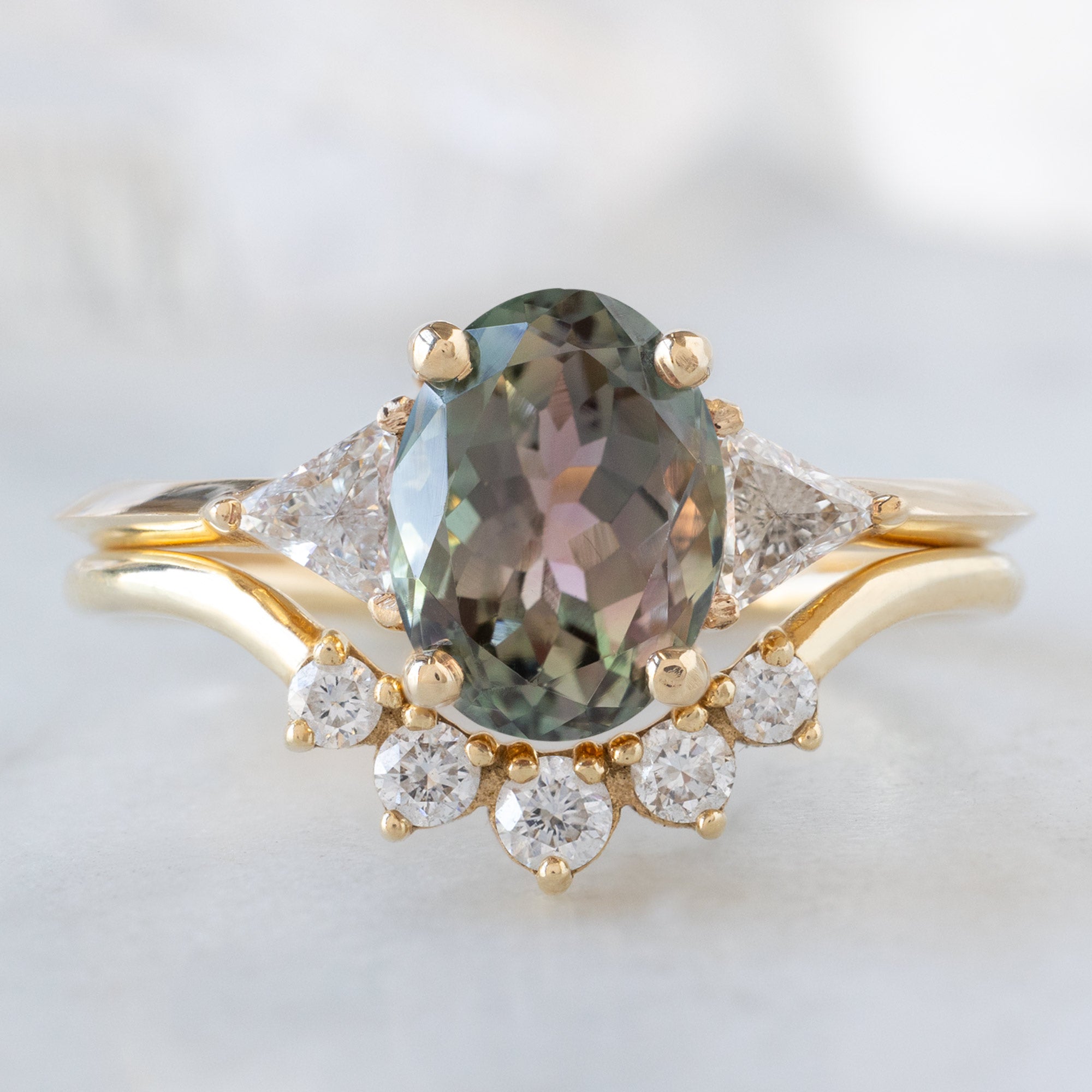 The Jade Ring with a 1.41ct Oval Green Tourmaline in 14K Yellow Gold Stacked with the Round White Diamond Sunburst Stacking Band