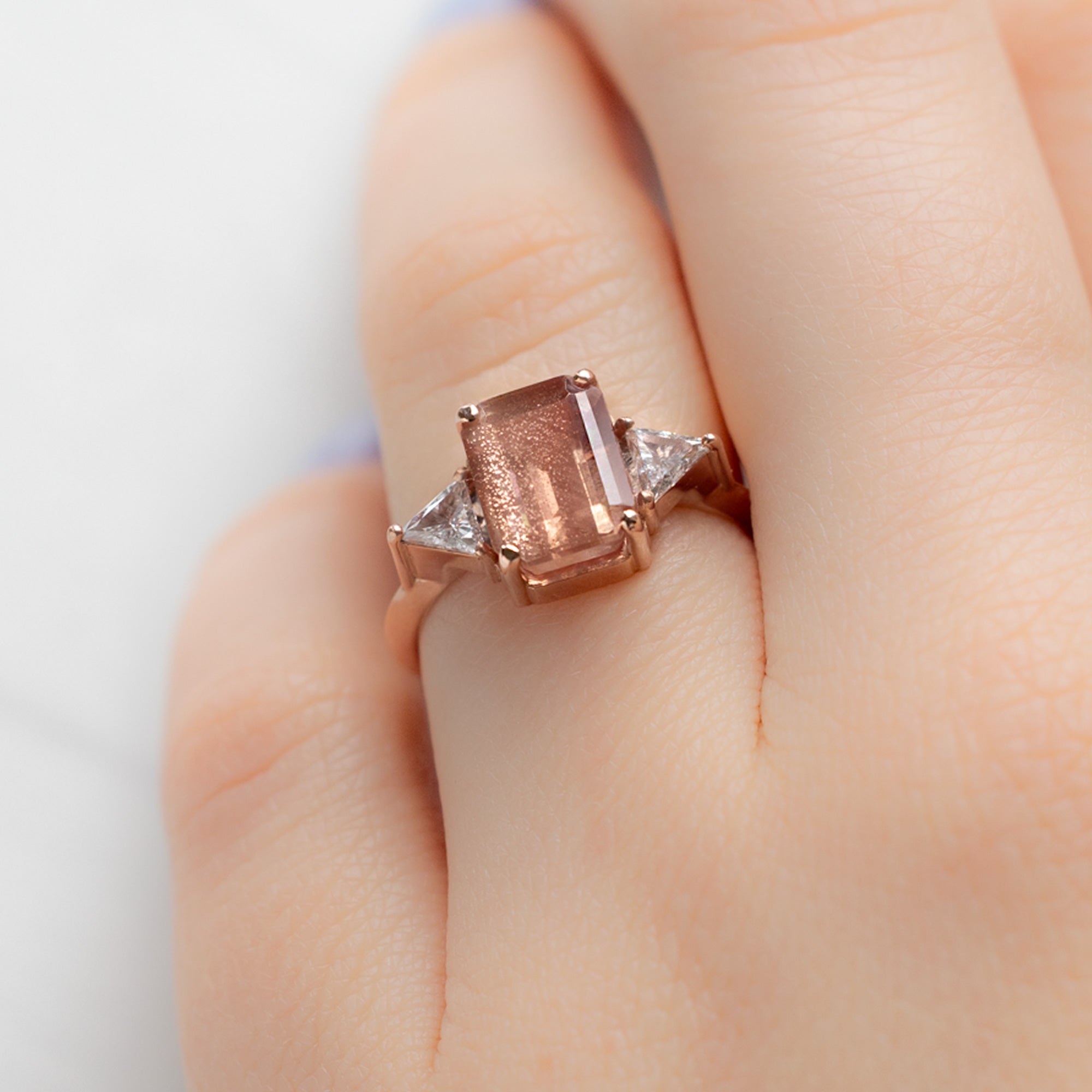 The Jade Ring with a 2.26ct Emerald Cut Sunstone in 14K Rose Gold on model