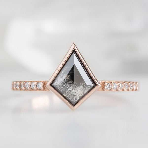 The Willow Ring with a 0.92ct Kite Black Diamond in 14K Rose Gold on White Marble