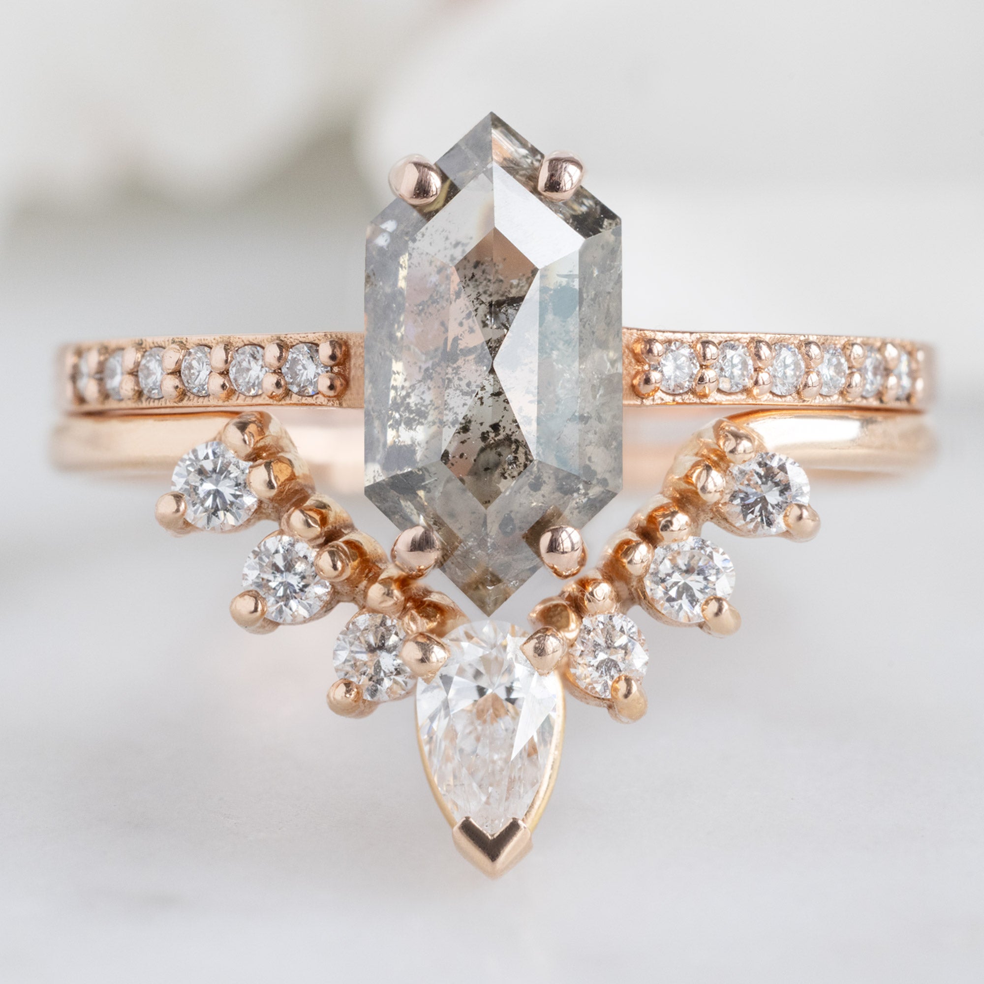 The Willow Ring with a 1.37ct Hexagon Salt and Pepper Diamond in 14K Rose Gold Stacked with White Diamond Sunburst Stacking Band