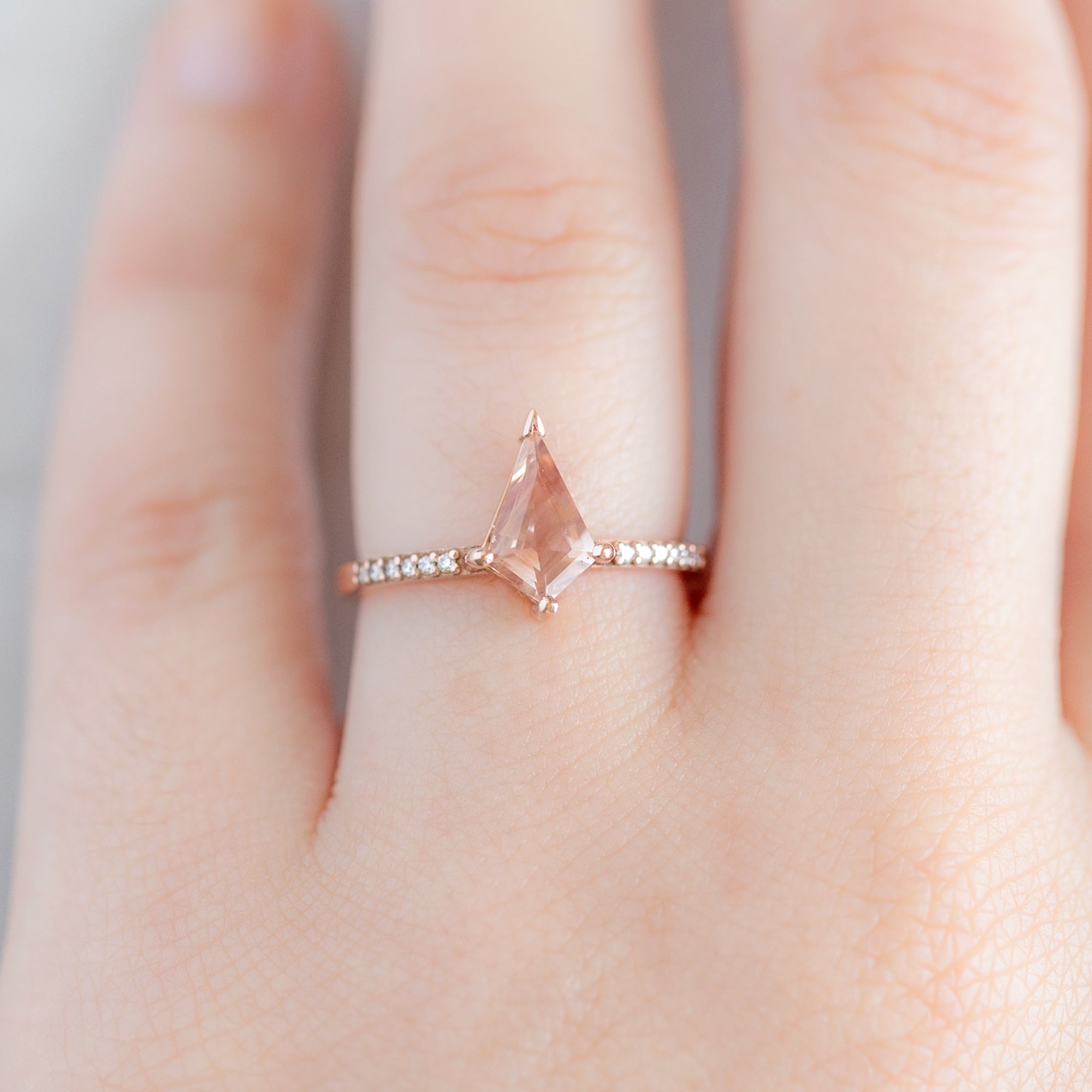 The Willow Ring with a 0.79ct Kite Sunstone in 14K Rose Gold on Model