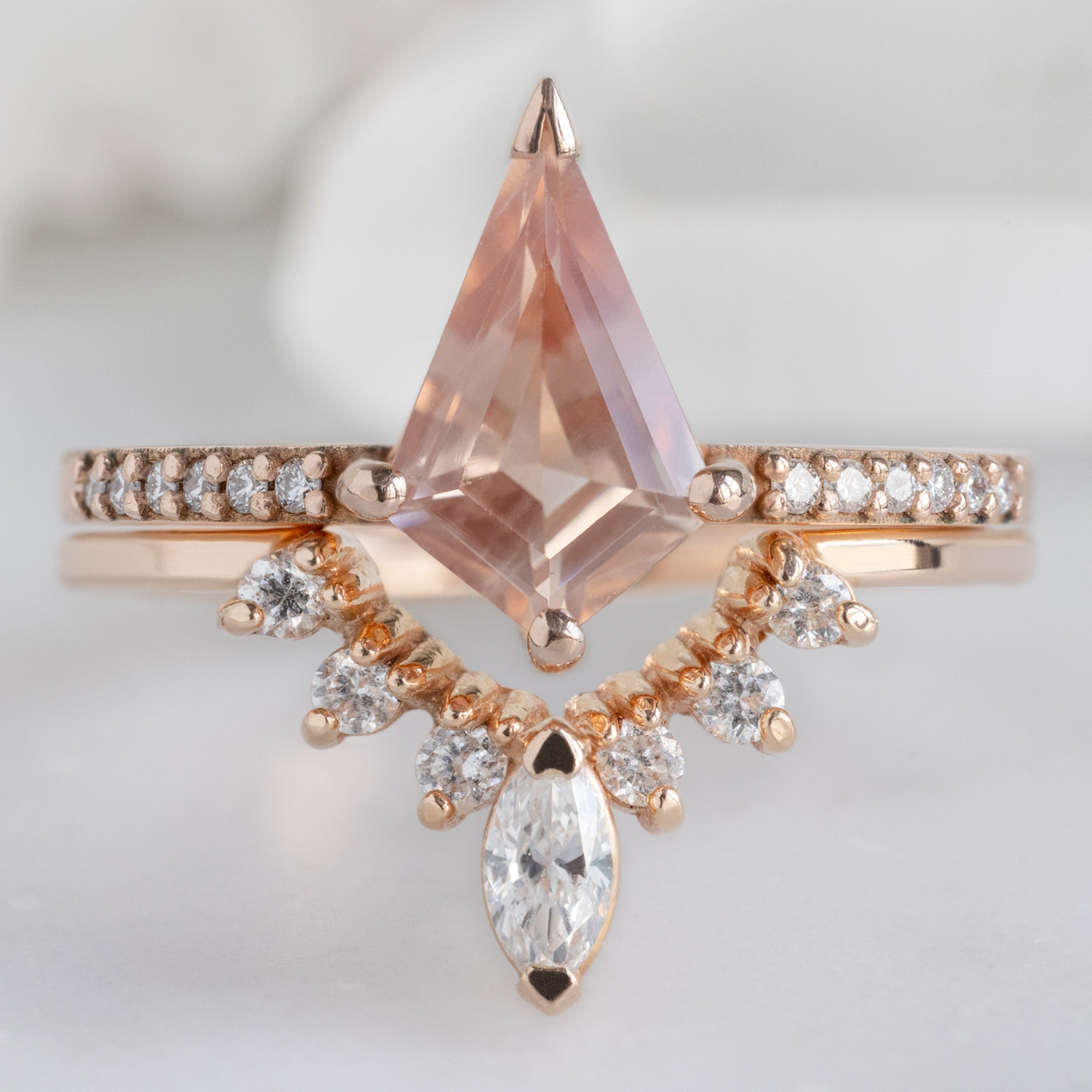 The Willow Ring with a 0.79ct Kite Sunstone in 14K Rose Gold Stacked with the White Diamond Sunburst Stacking Band