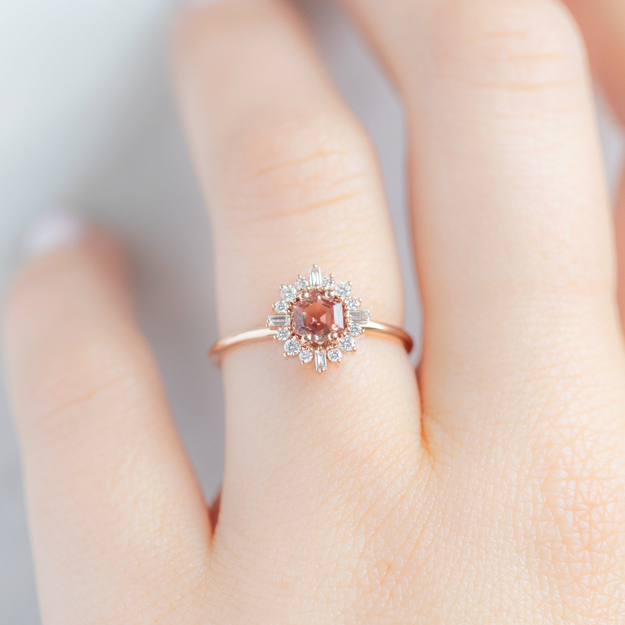 The Compass Ring with a 0.37ct Hexagon Sunstone in 14K Rose Gold on Model