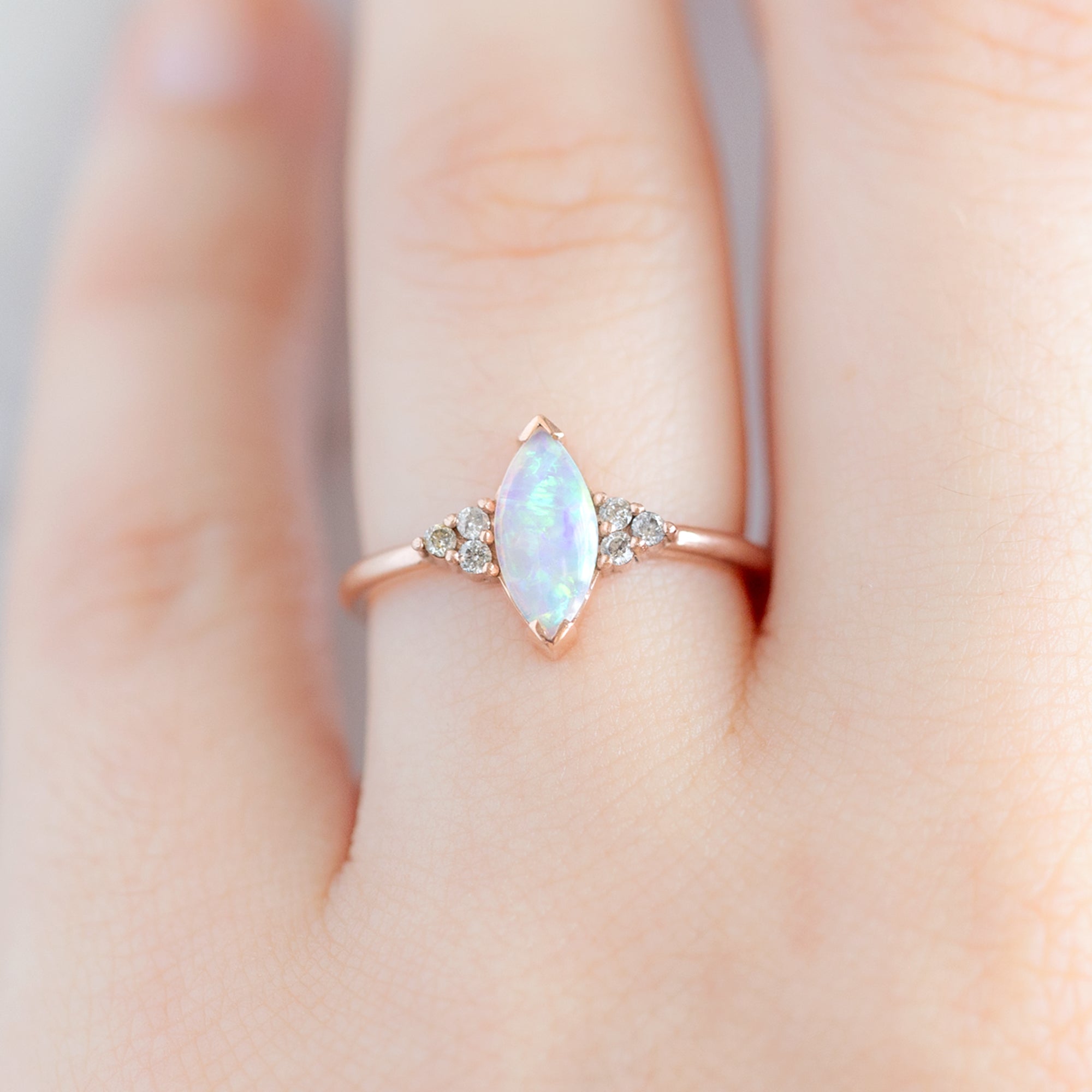 The Ivy Ring with a 0.37ct Marquise Opal in 14K Rose Gold on Model