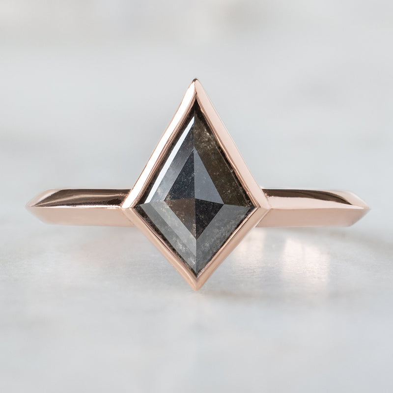 The Hazel Ring with a 1.13ct Kite Black Diamond in 14K Rose Gold on White Marble