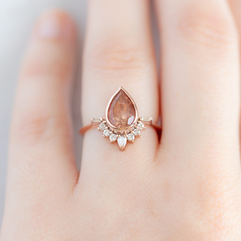 The Posy Ring with a Per Shaped Sunstone in 14K Rose Gold on model
