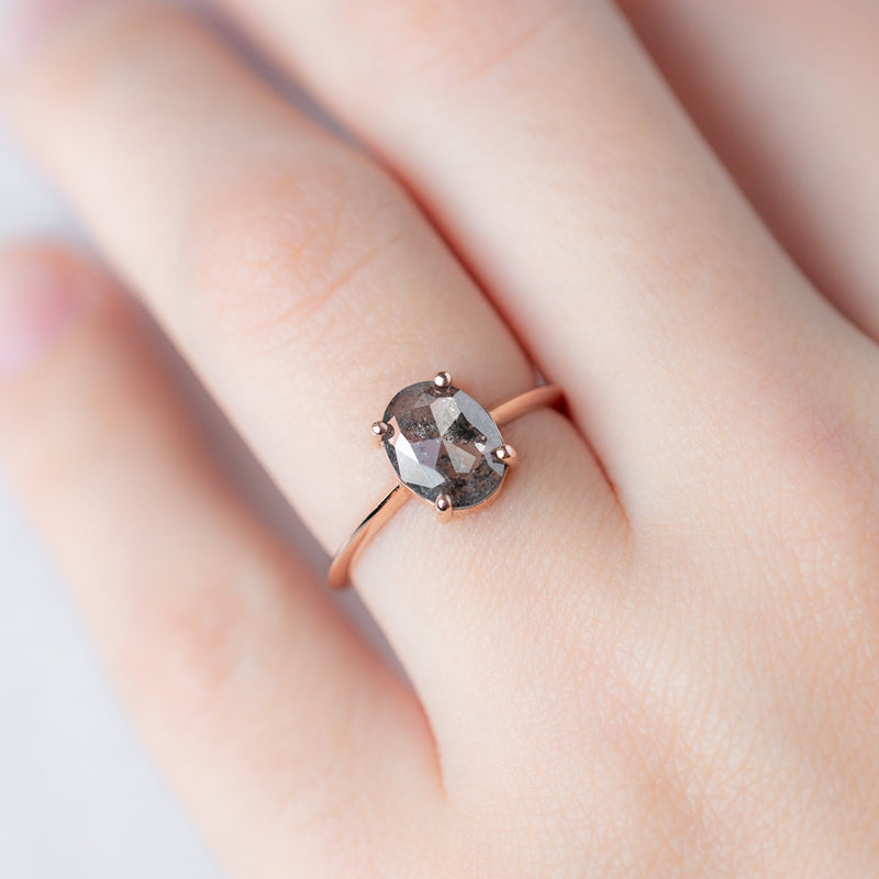 The Bryn Ring with a 0.89ct Oval Cut Salt and Pepper Diamond in 14K Rose Gold on model