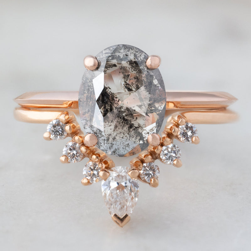 The Bryn Ring with a 0.89ct Oval Cut Salt and Pepper Diamond in 14K Rose Gold with Pear White Diamond Sunburst Stacking Band