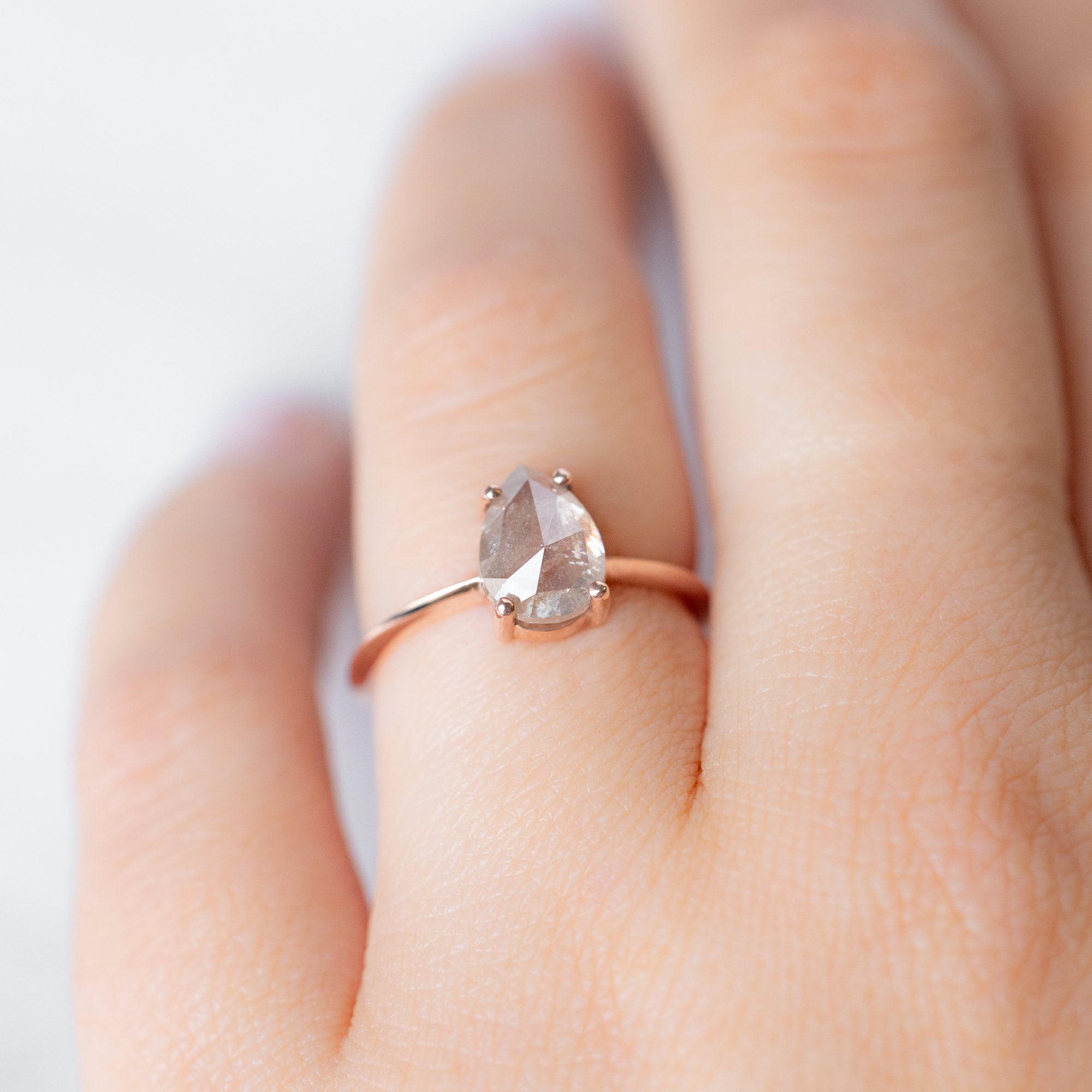 The Bryn Ring with a 1.76ct Pear Pink Diamond in 14K Rose Gold on model