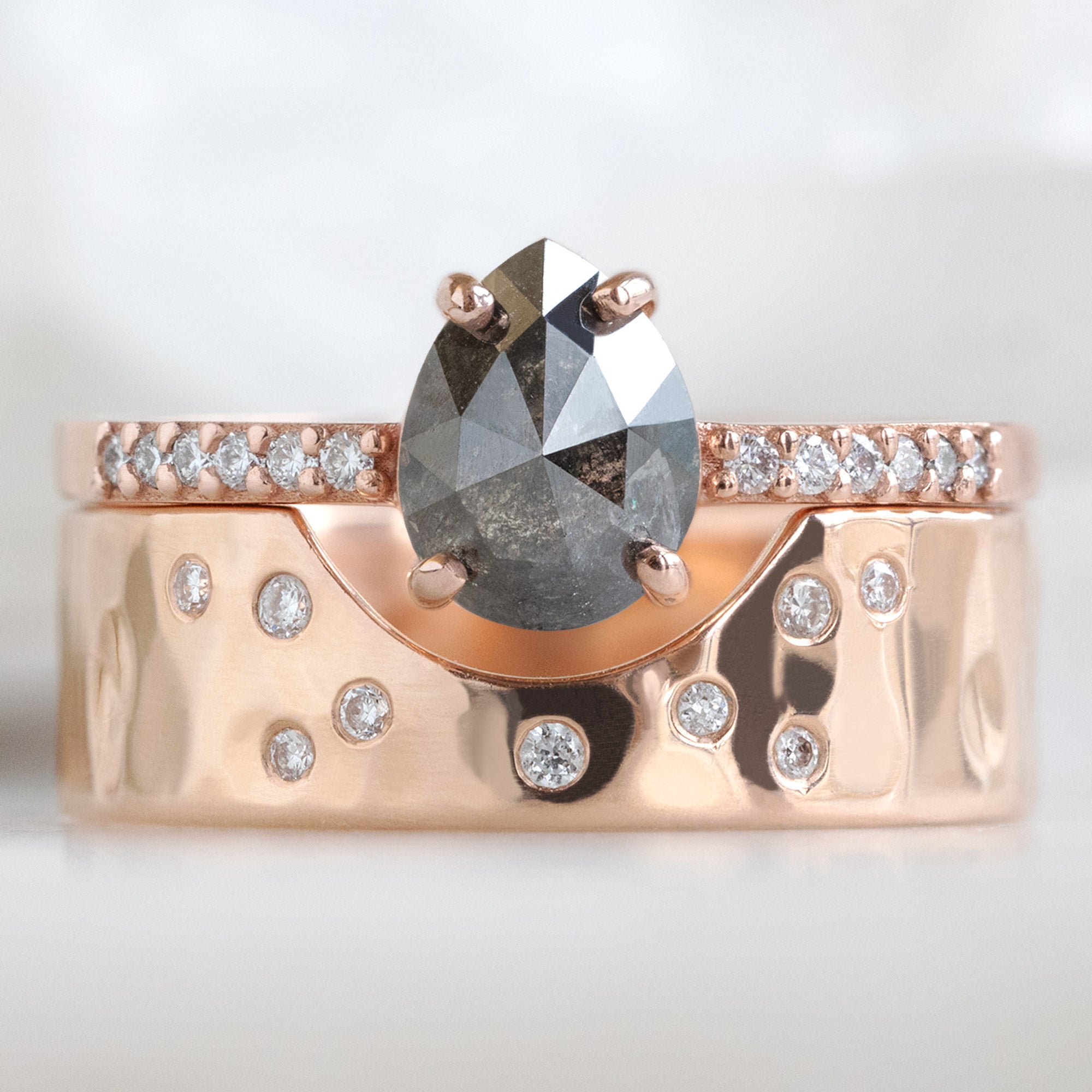 buy:the-willow-ring-0-81ct-pear-black-diamond-in-14k-rose-gold,constellation-cut-out-stacking-band-arc-cut-out-in-14k-rose-gold