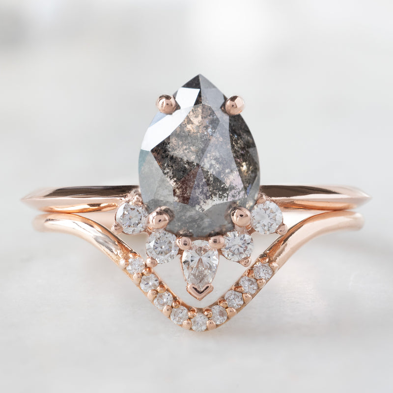 The Aster Ring with a 1.41ct Pear Black Diamond in 14K Rose Gold Stacked with White Diamond Pavé Peak Stacking Band