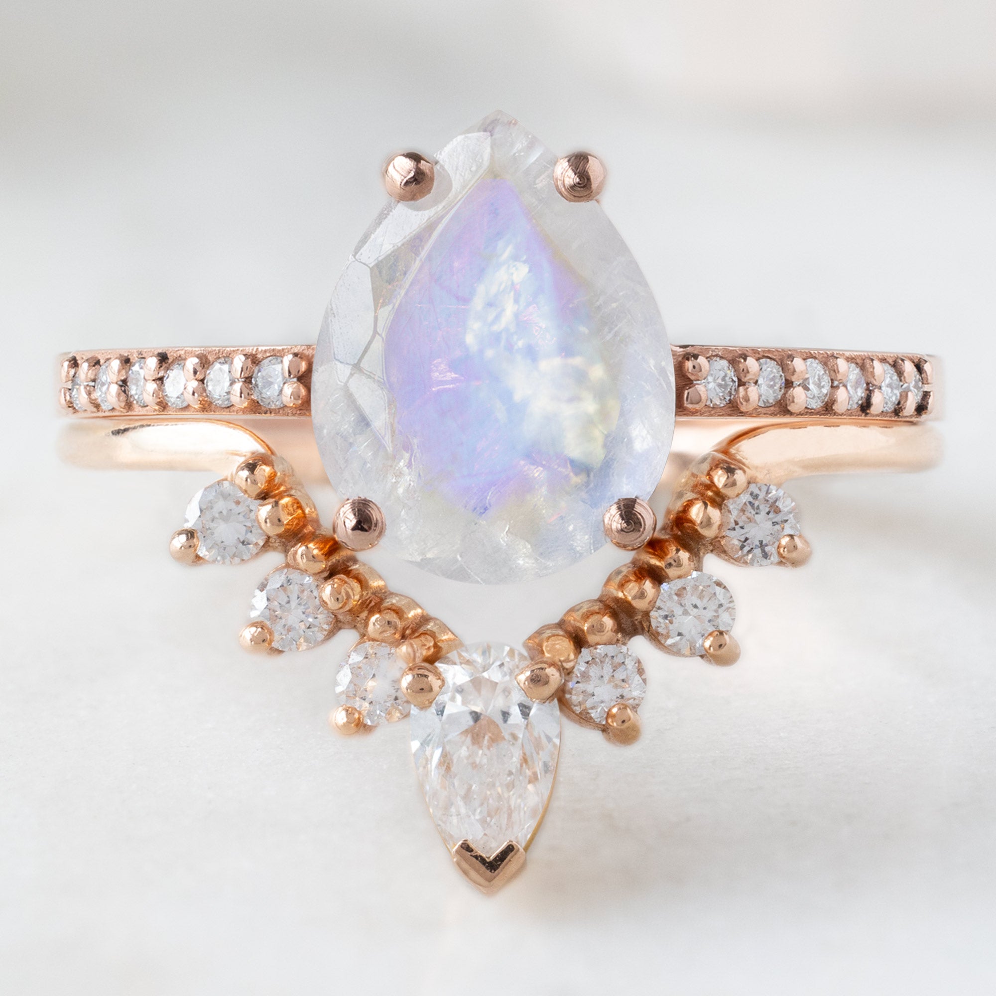 buy:the-willow-ring-1-38ct-pear-moonstone-in-14k-rose-gold,white-pear-diamond-sunburst-stacking-band-14k-gold